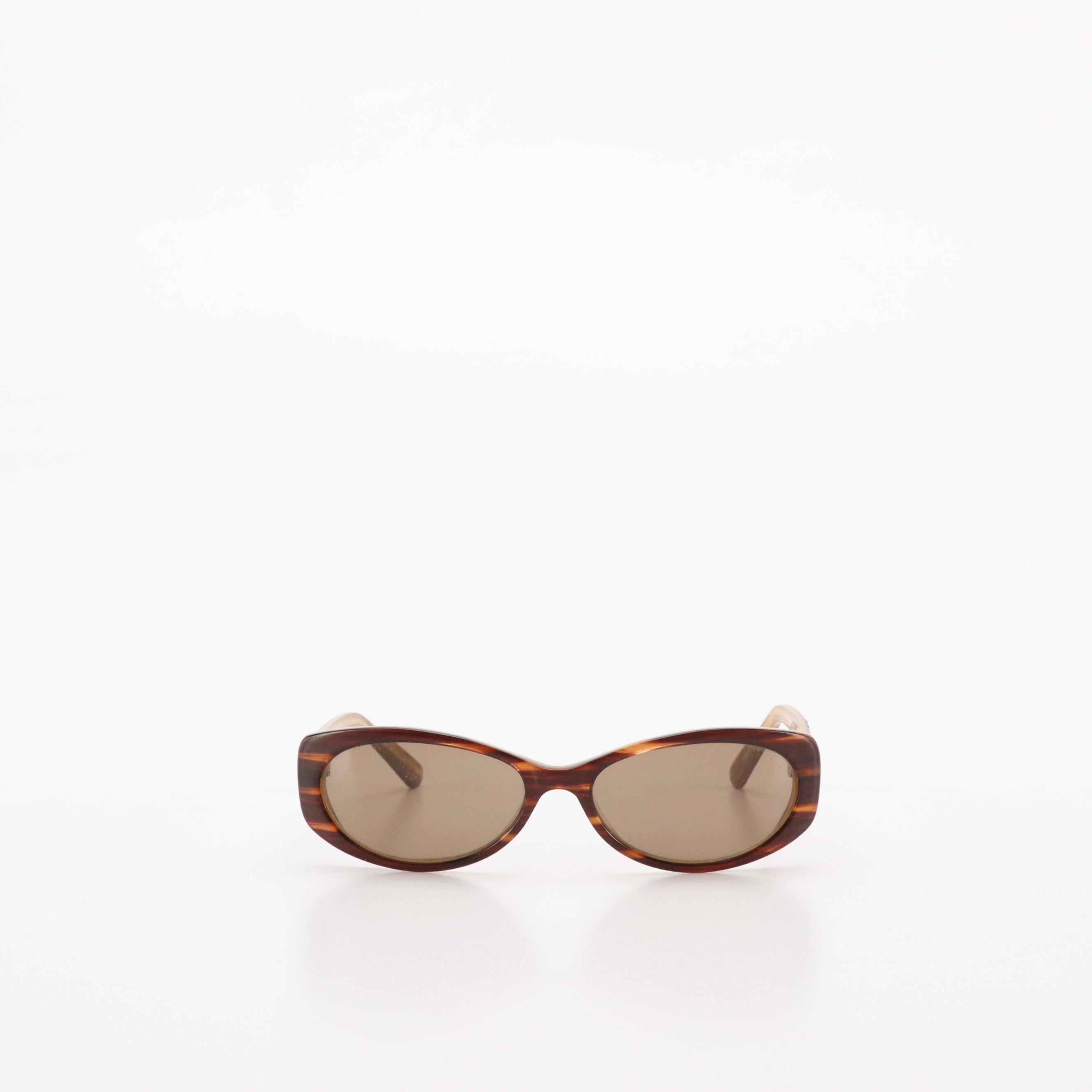 Salvatore Ferragamo Gancini Sunglasses, Anna Sui Oval Sunglasses, and More