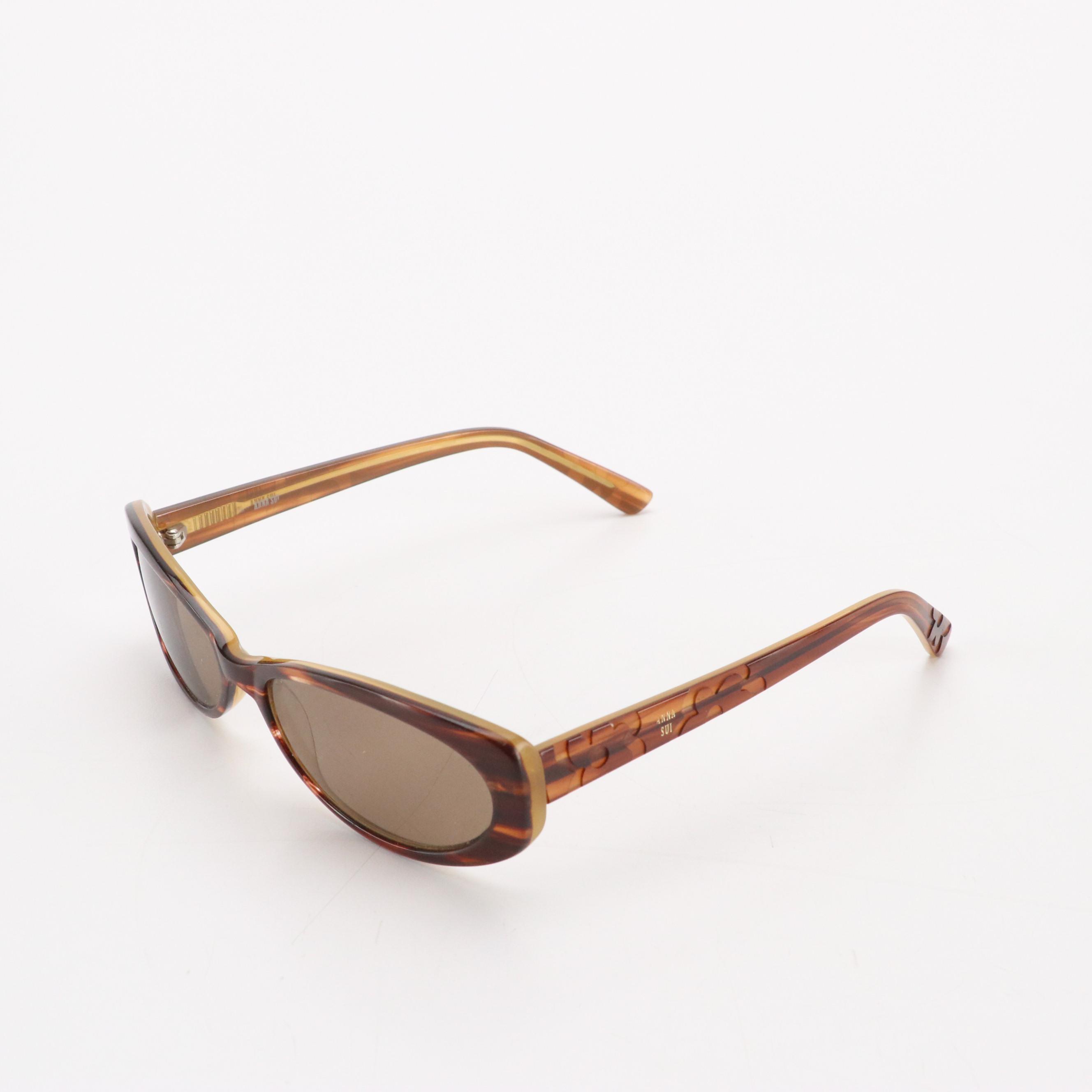 Salvatore Ferragamo Gancini Sunglasses, Anna Sui Oval Sunglasses, and More