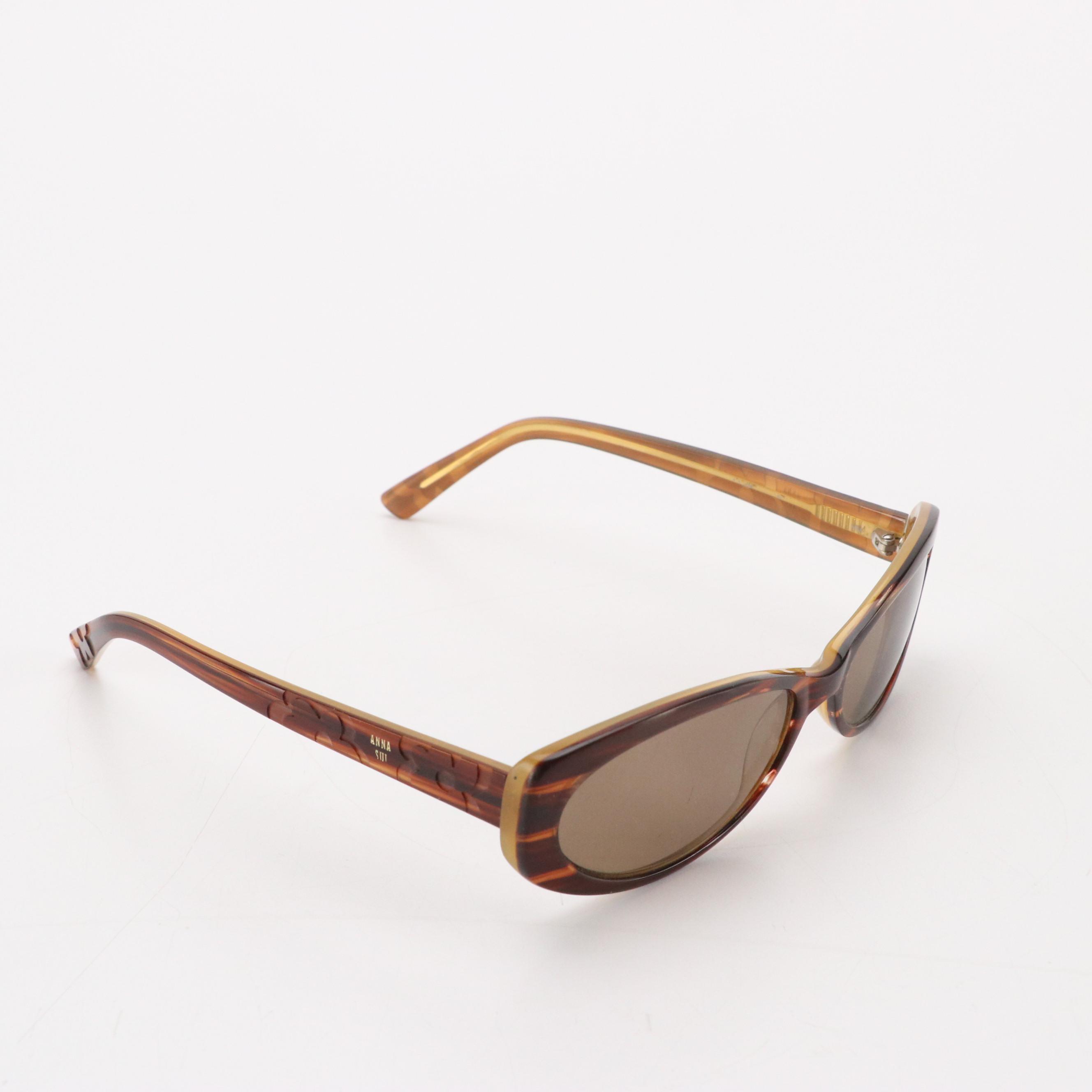 Salvatore Ferragamo Gancini Sunglasses, Anna Sui Oval Sunglasses, and More