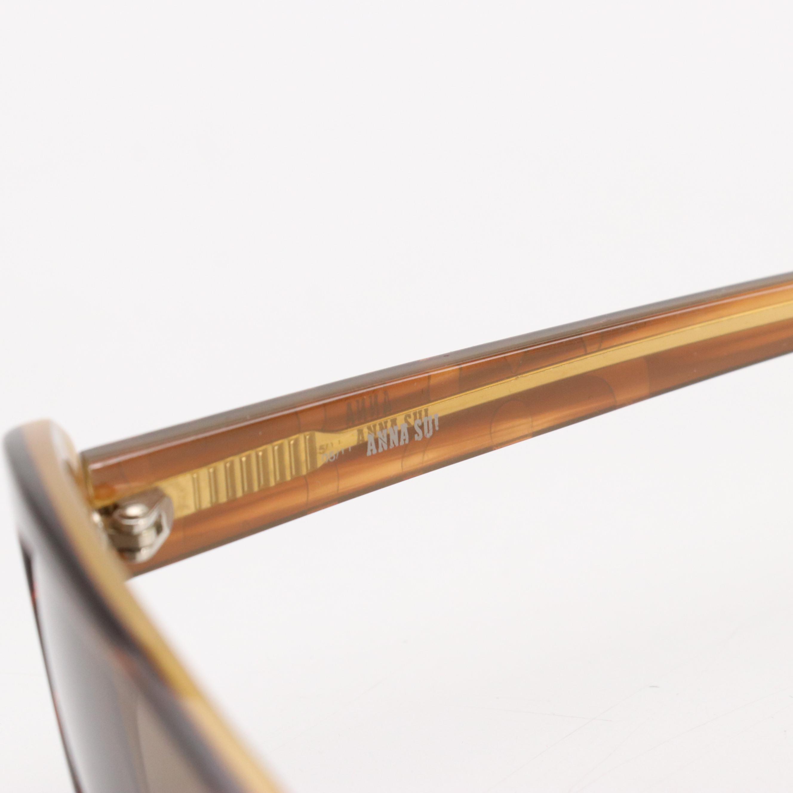 Salvatore Ferragamo Gancini Sunglasses, Anna Sui Oval Sunglasses, and More