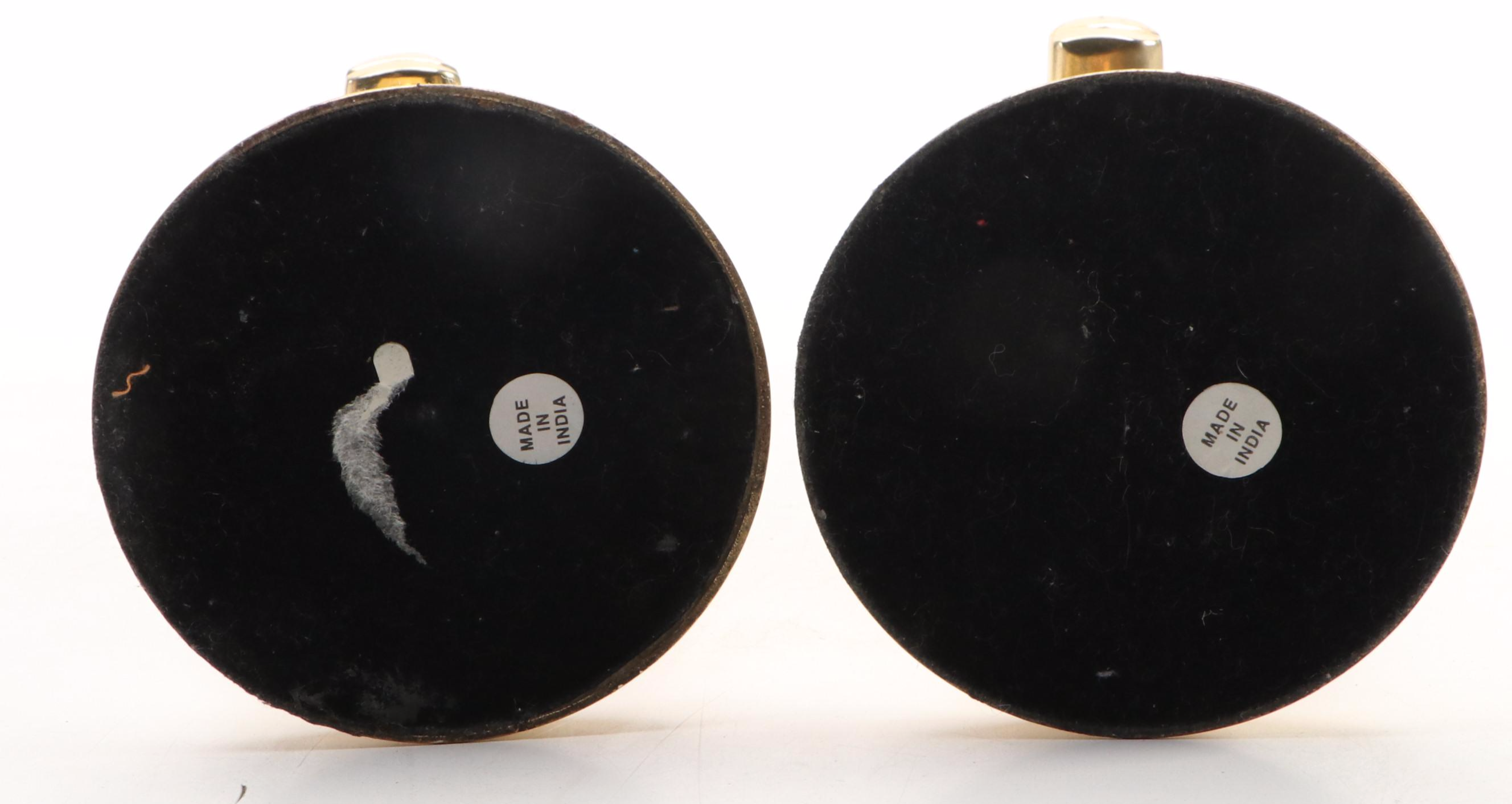 Pair of Indian Brass Stag Head Candlesticks