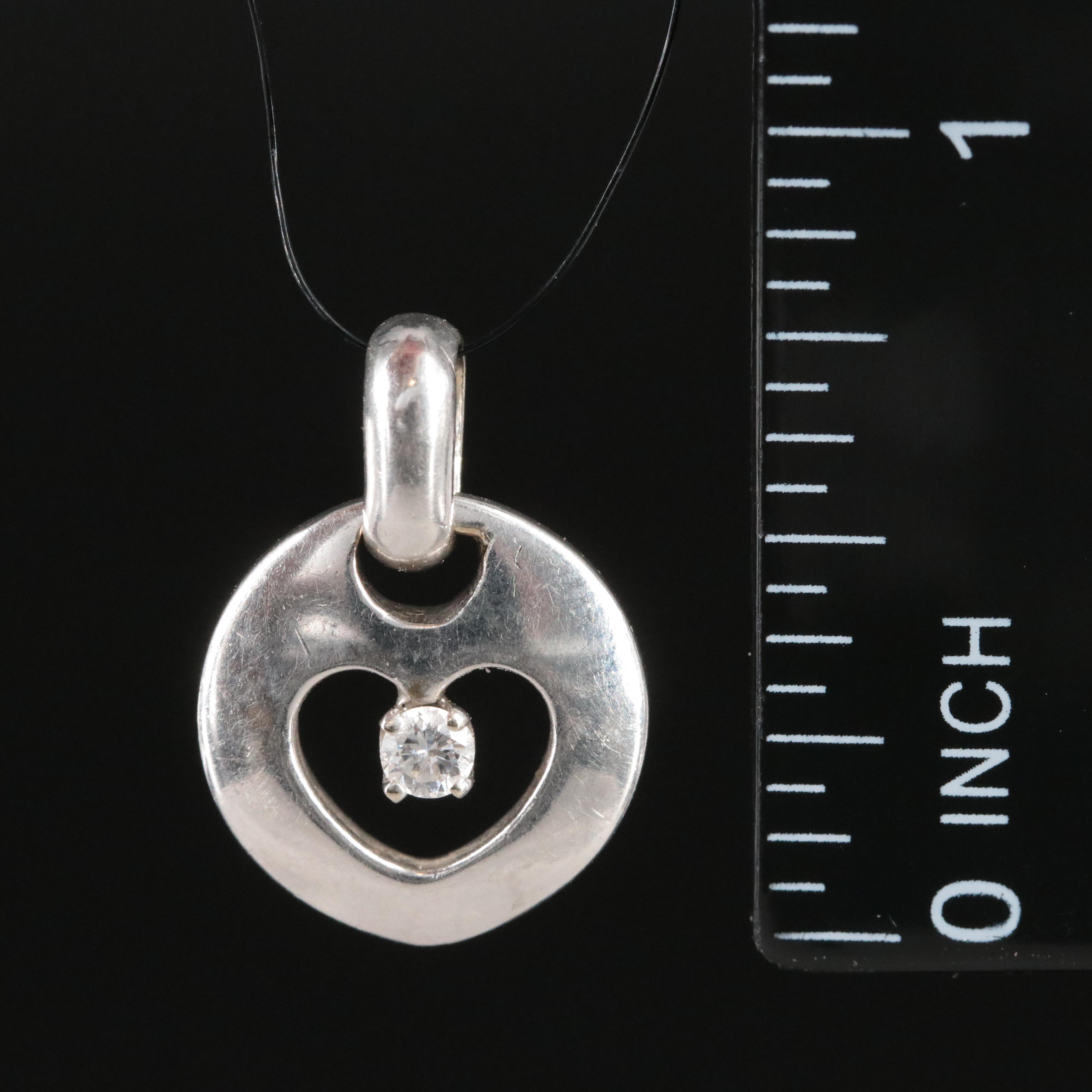 14K 0.08 CT Diamond Heart Pendant