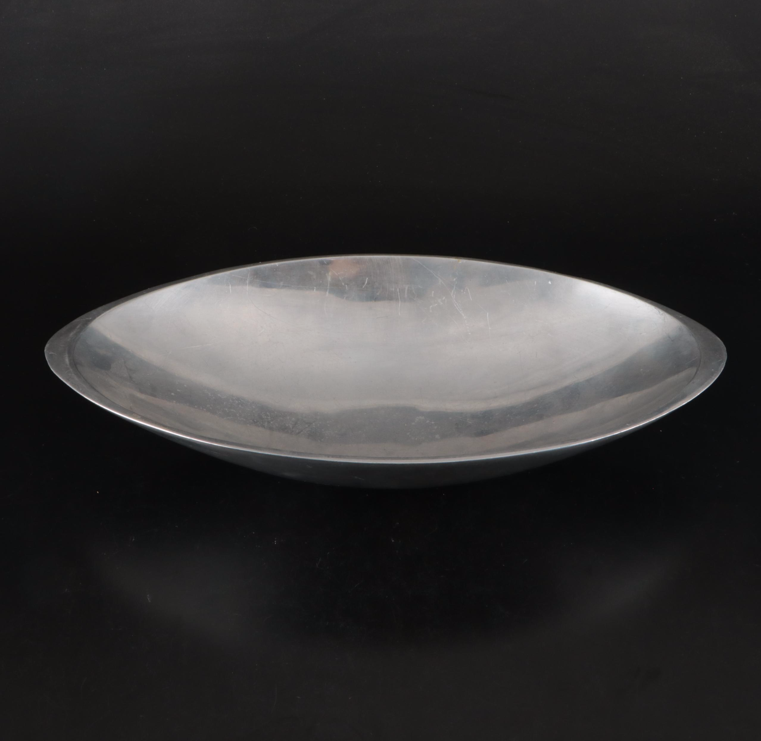 Nambe Bowl with Other Pewter and Metal Serving Pieces, 20th Century