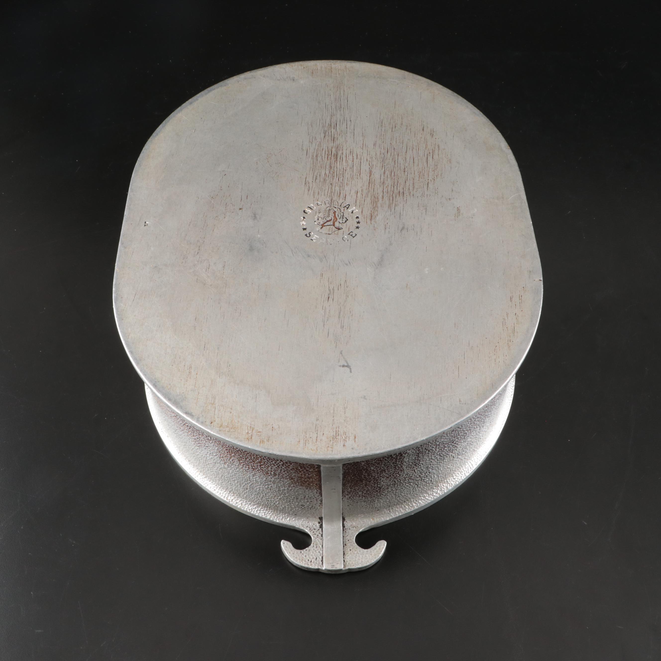 Nambe Bowl with Other Pewter and Metal Serving Pieces, 20th Century