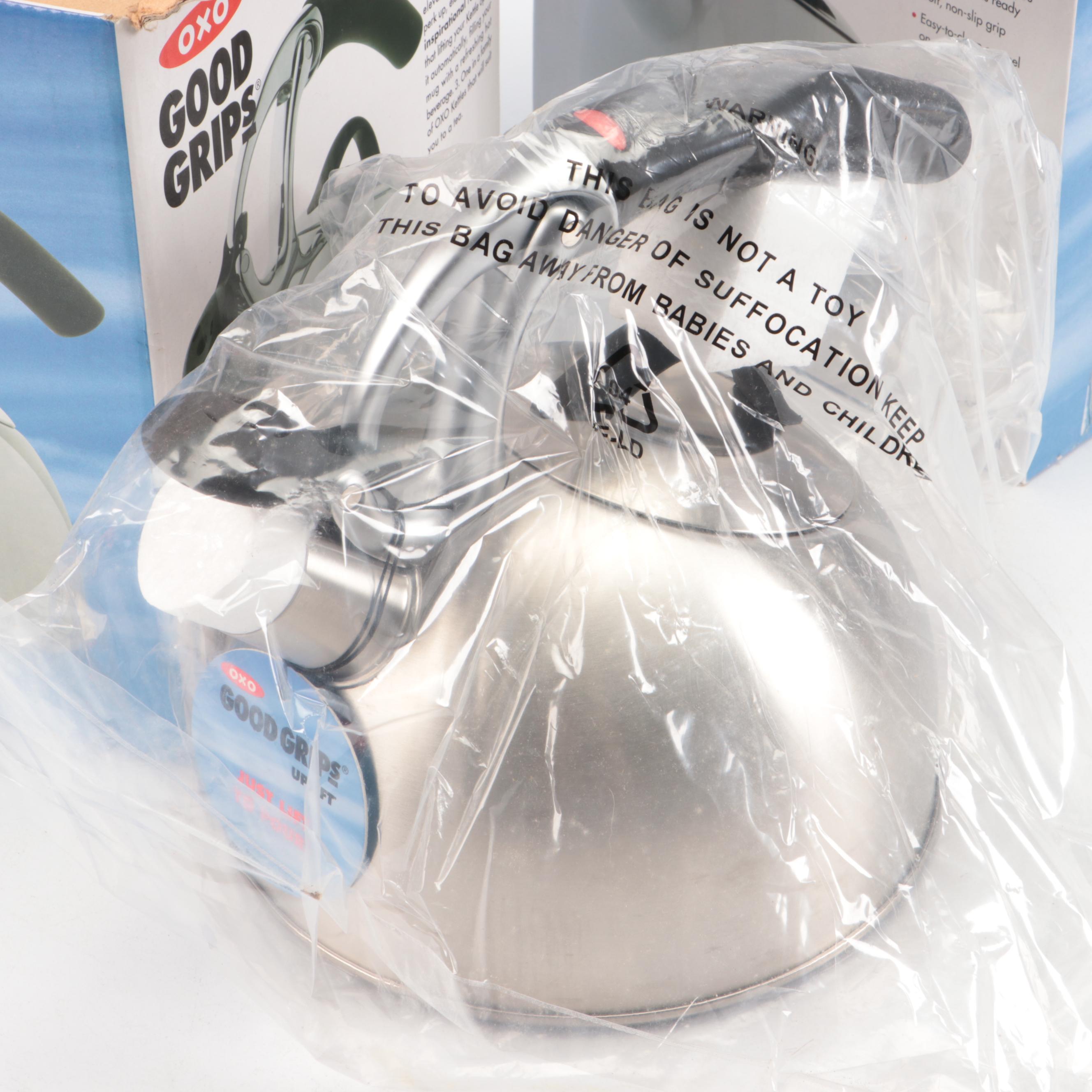 Le Creuset Cast Iron Fry Pan with OXO Stainless Steel and Enamel Tea Kettles