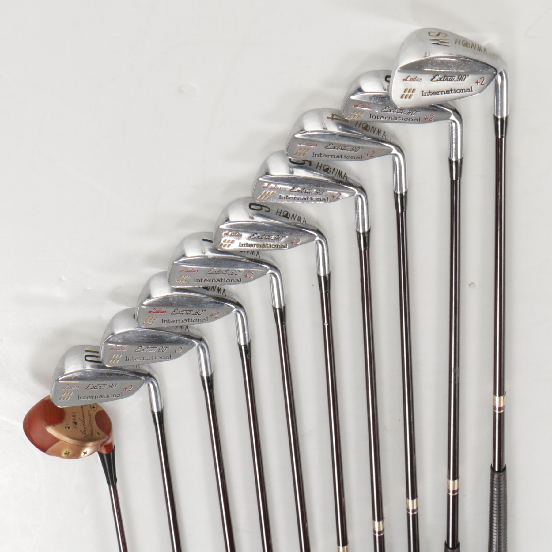 Honma Metallic Leather Golf Bag with Ladies Wood Club, Irons and More