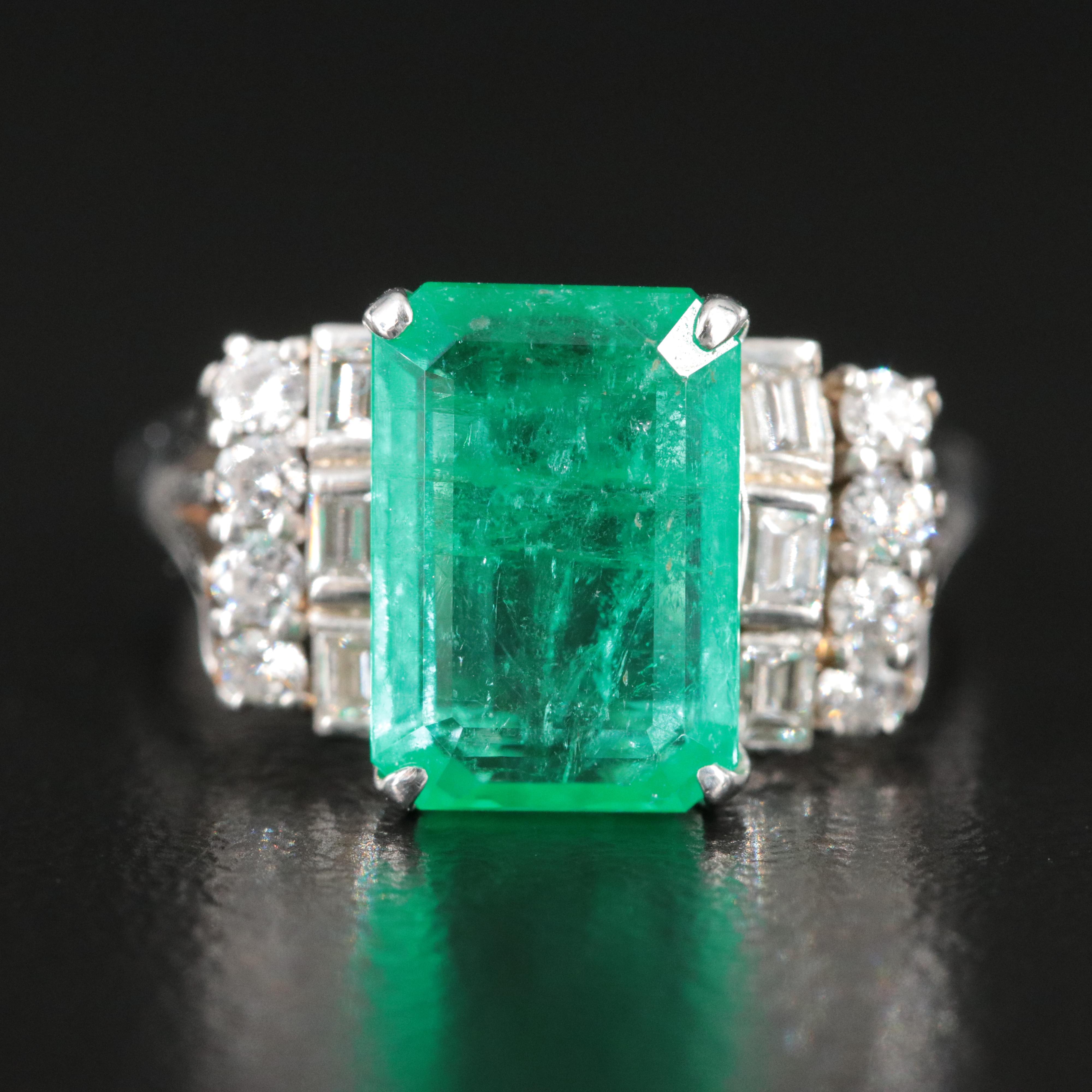 Platinum Emerald and 0.48 CTW Diamond Ring