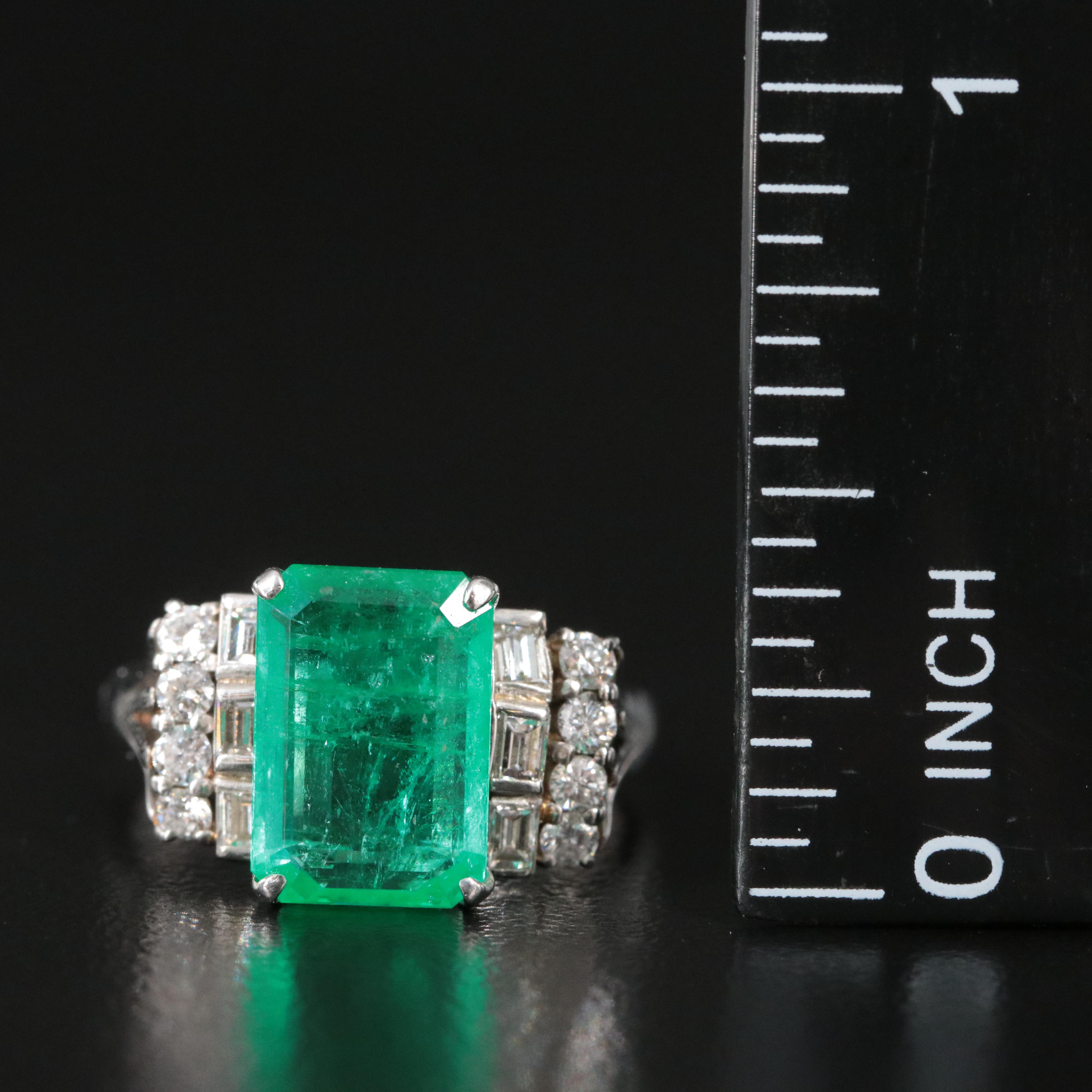 Platinum Emerald and 0.48 CTW Diamond Ring