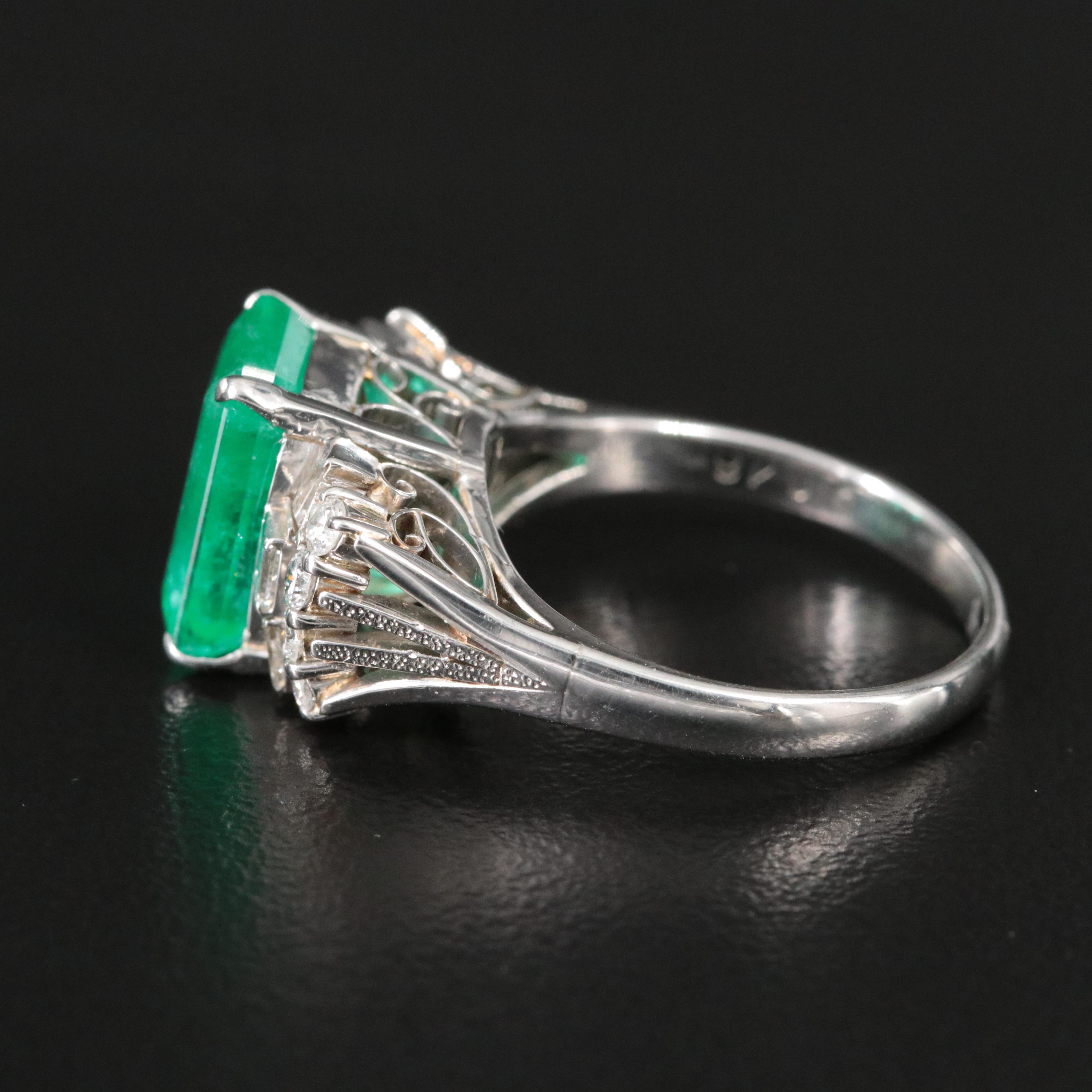 Platinum Emerald and 0.48 CTW Diamond Ring