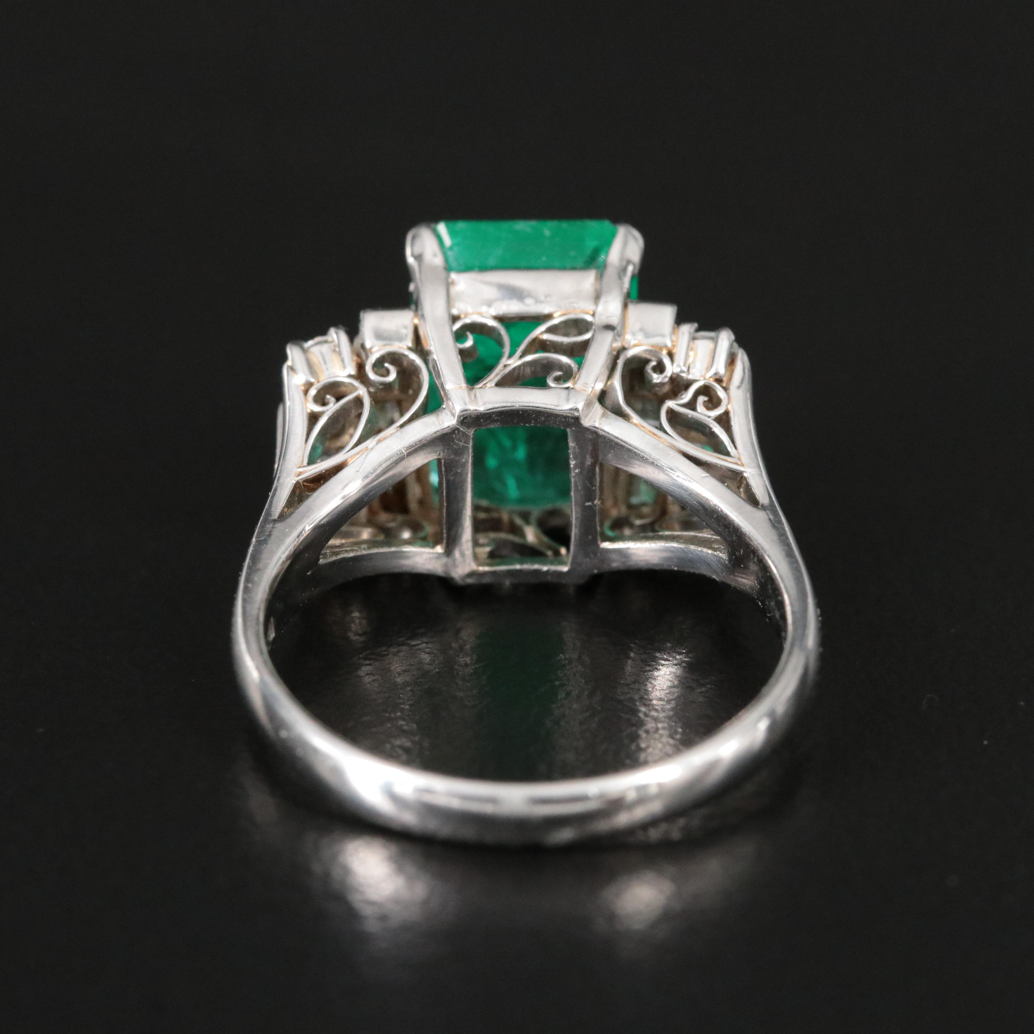 Platinum Emerald and 0.48 CTW Diamond Ring