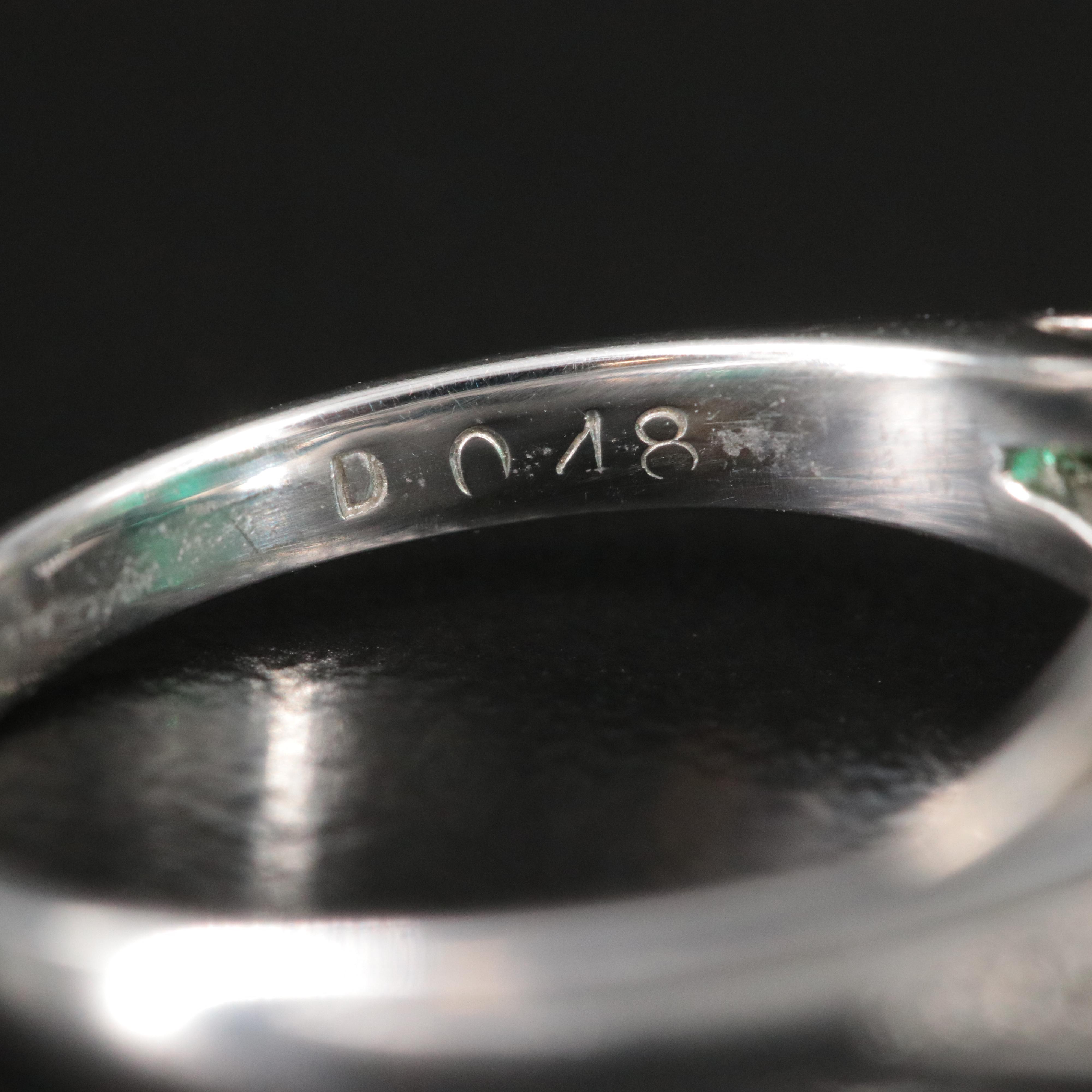 Platinum Emerald and 0.48 CTW Diamond Ring