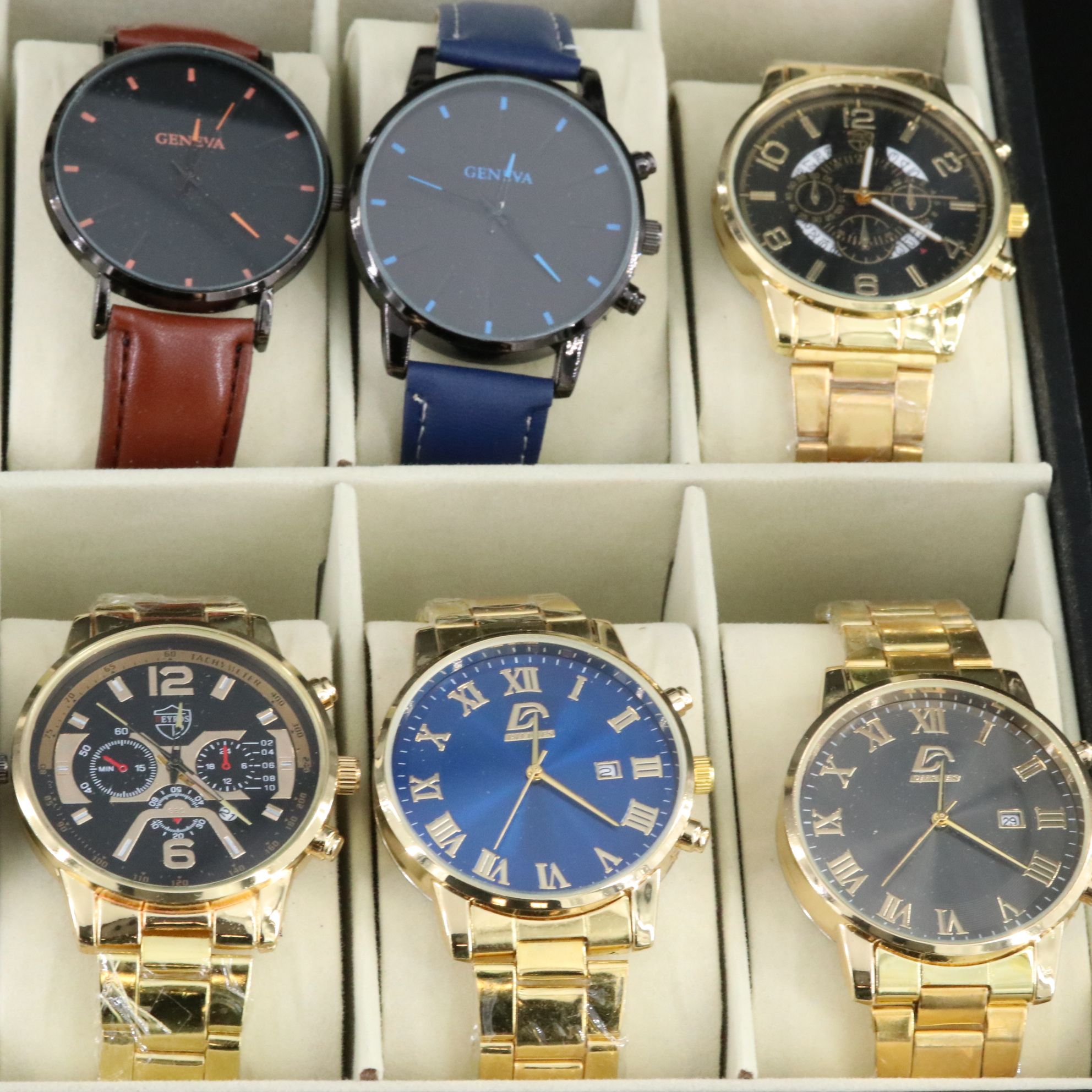 Collection of Quartz Watches in Watch Box Featuring Geneva