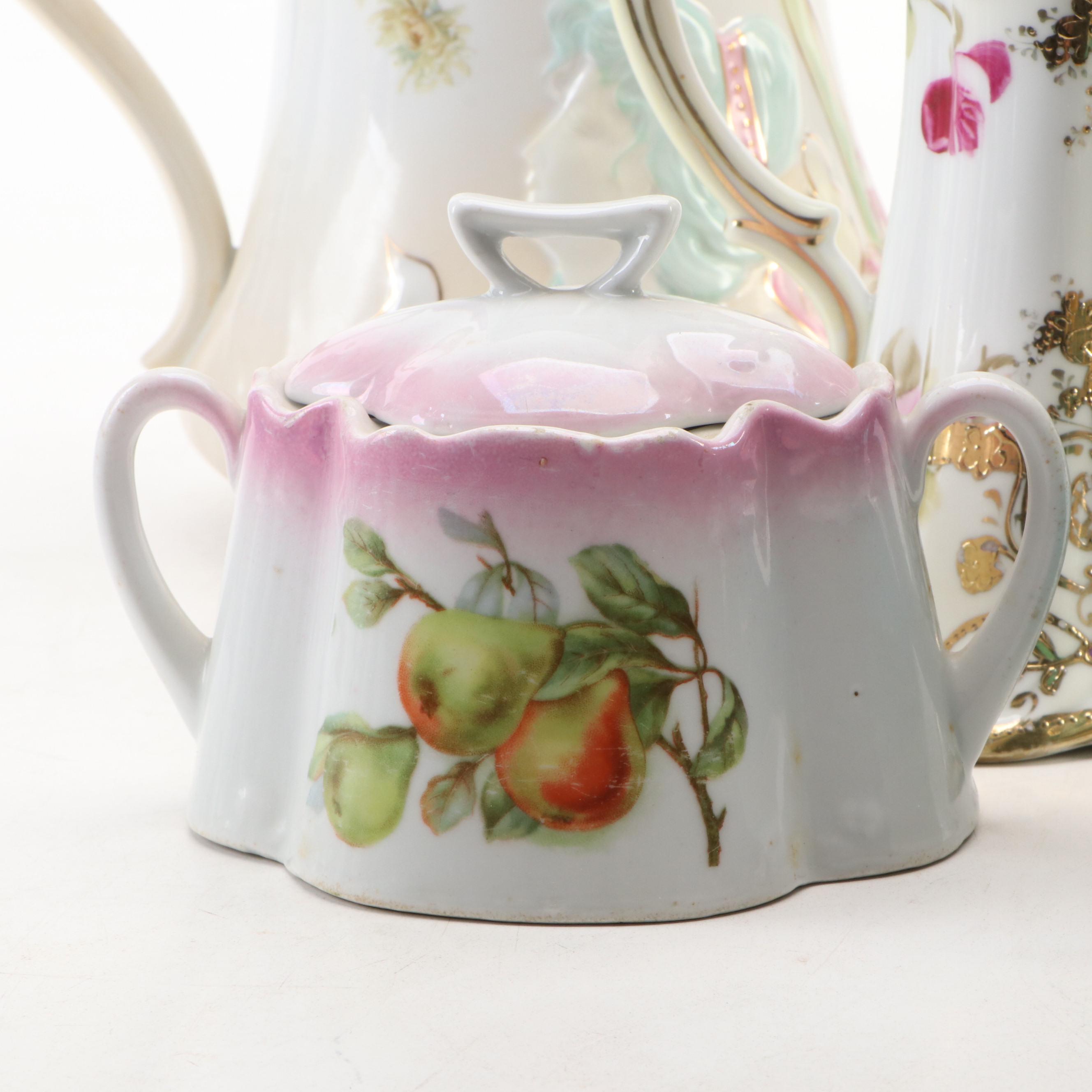 Nippon and Royal Austria Porcelain Teapots with Other Porcelain Teaware