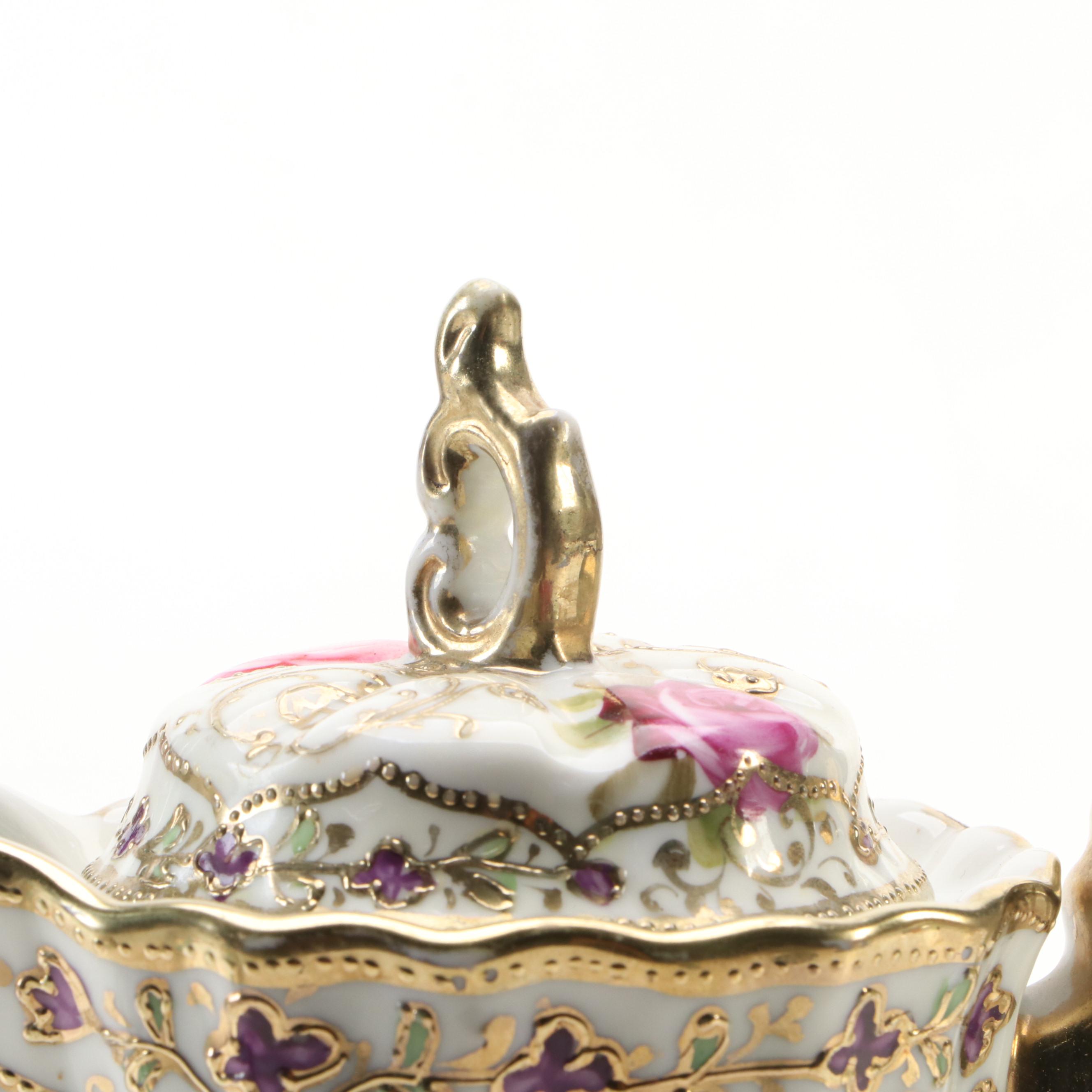 Nippon and Royal Austria Porcelain Teapots with Other Porcelain Teaware