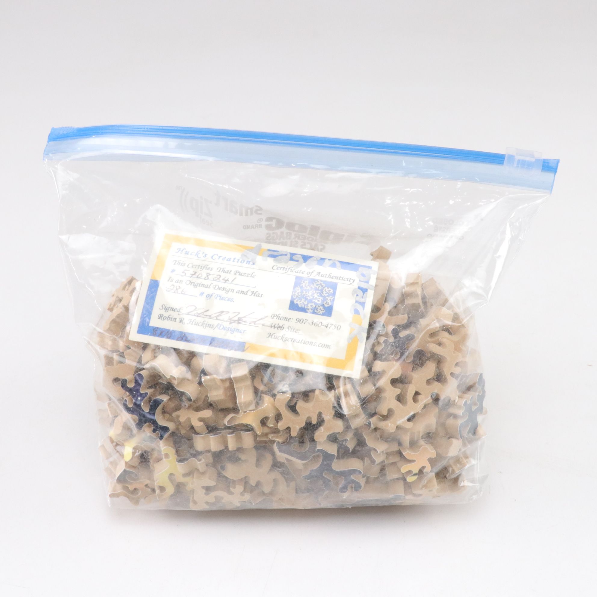 Six Precision Cut Jigsaw Puzzles