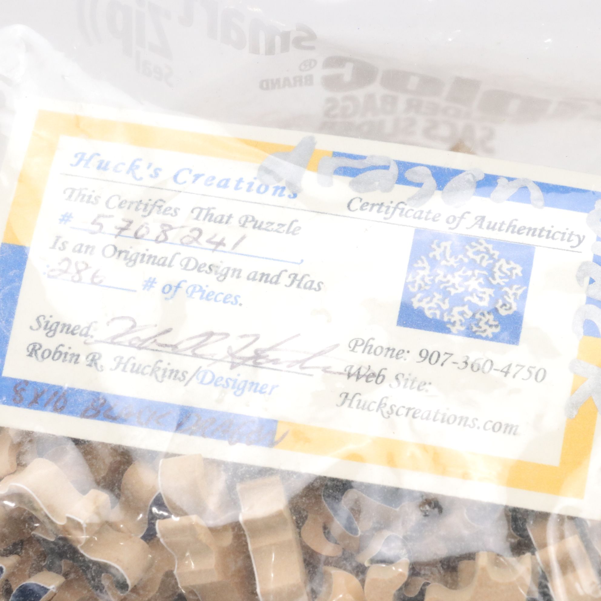 Six Precision Cut Jigsaw Puzzles