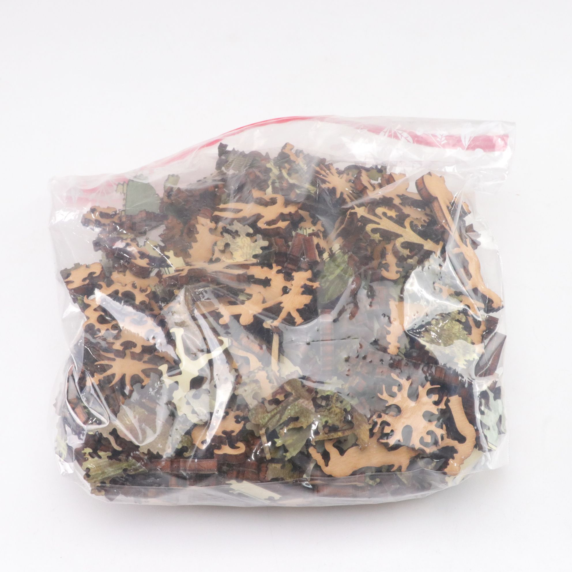 Six Precision Cut Jigsaw Puzzles