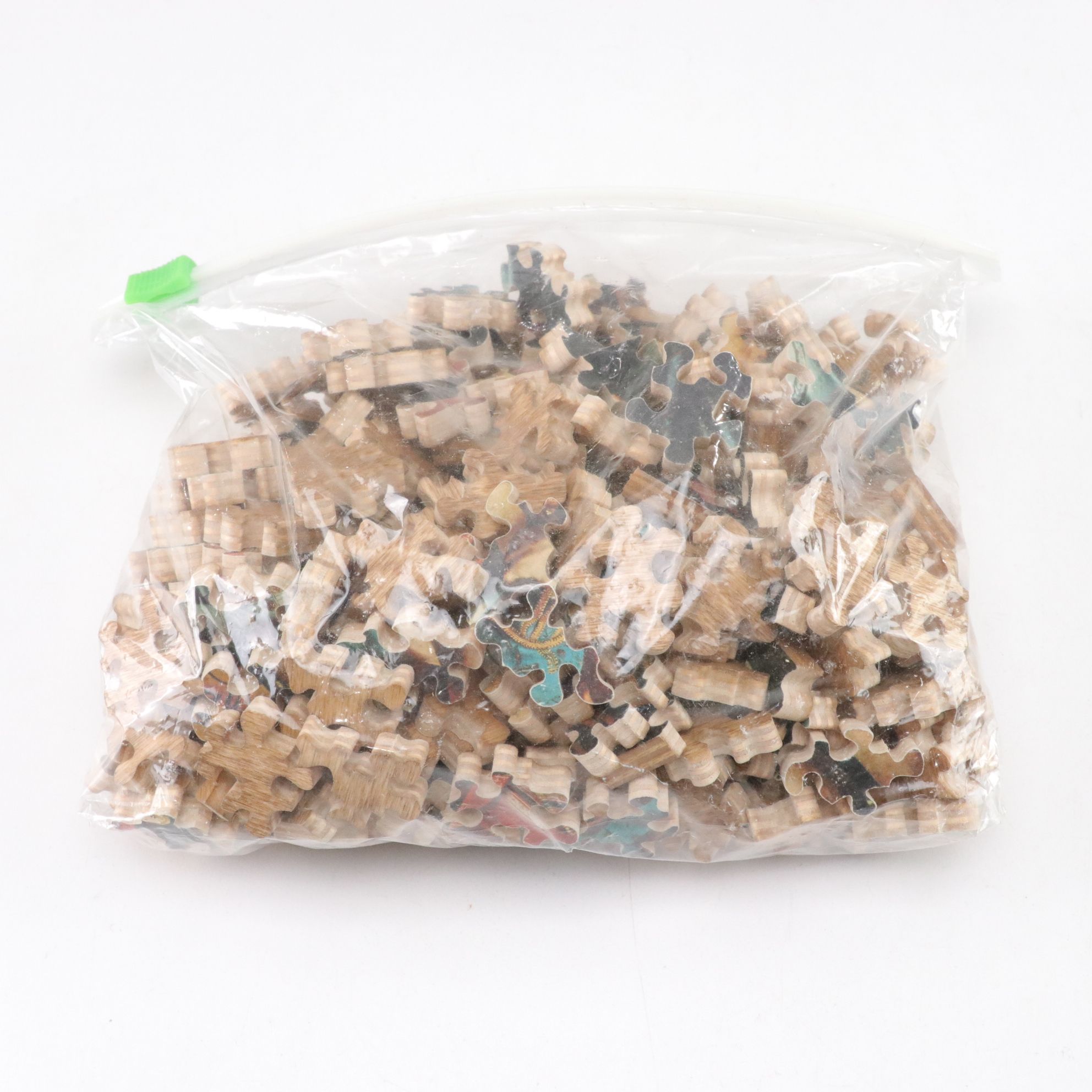 Six Precision Cut Jigsaw Puzzles