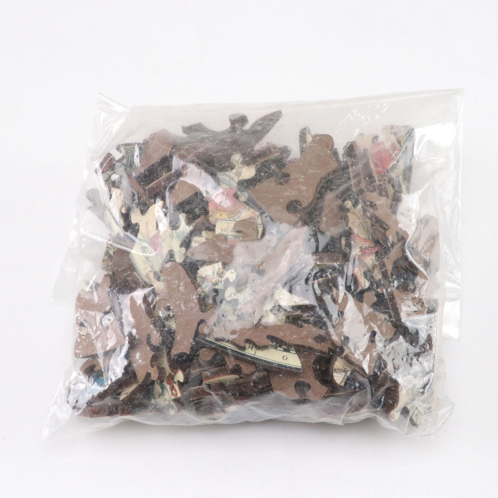 Six Precision Cut Jigsaw Puzzles