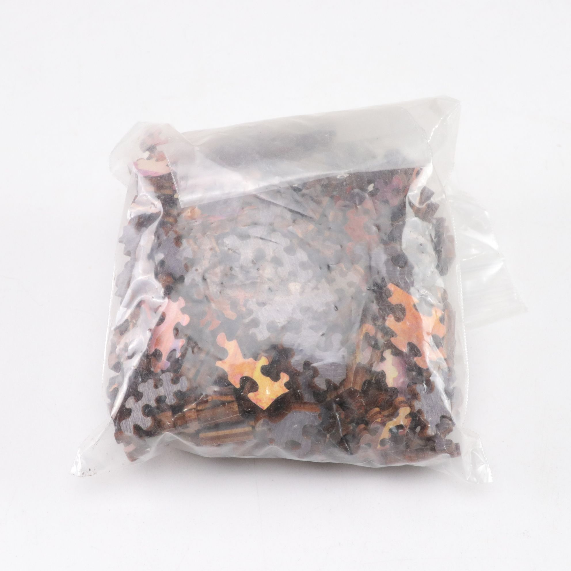 Six Precision Cut Jigsaw Puzzles