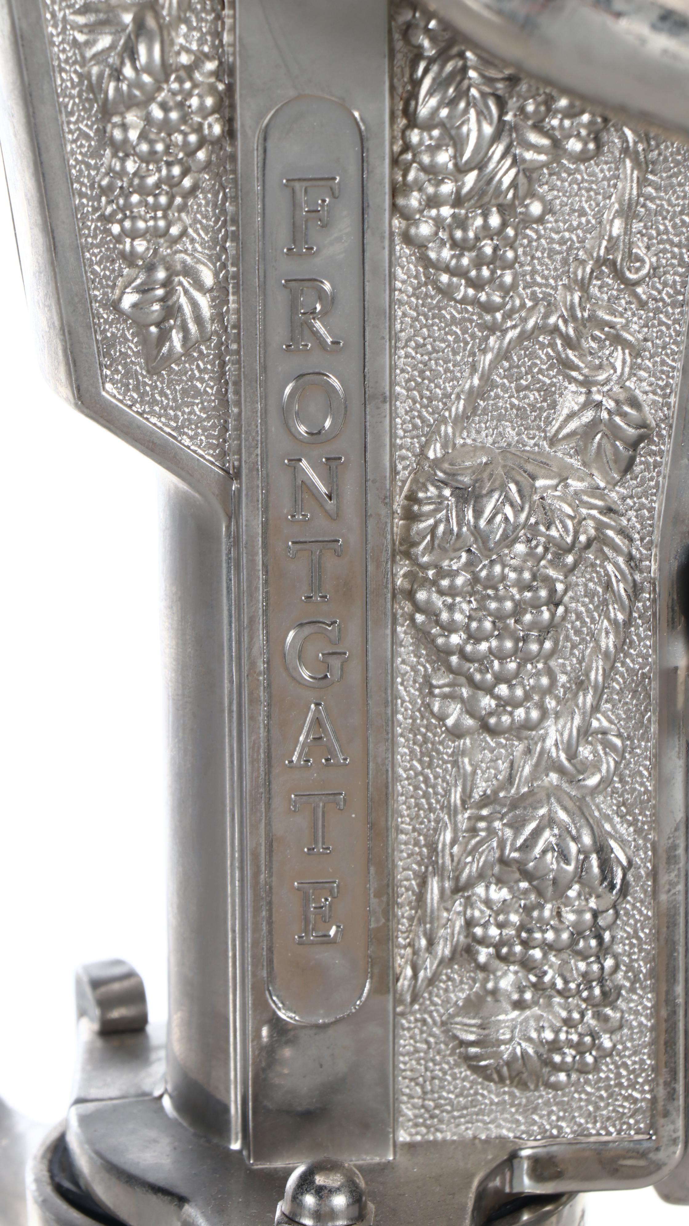 Frontgate Repoussé Metal and Black Granite Base Bottle Opener
