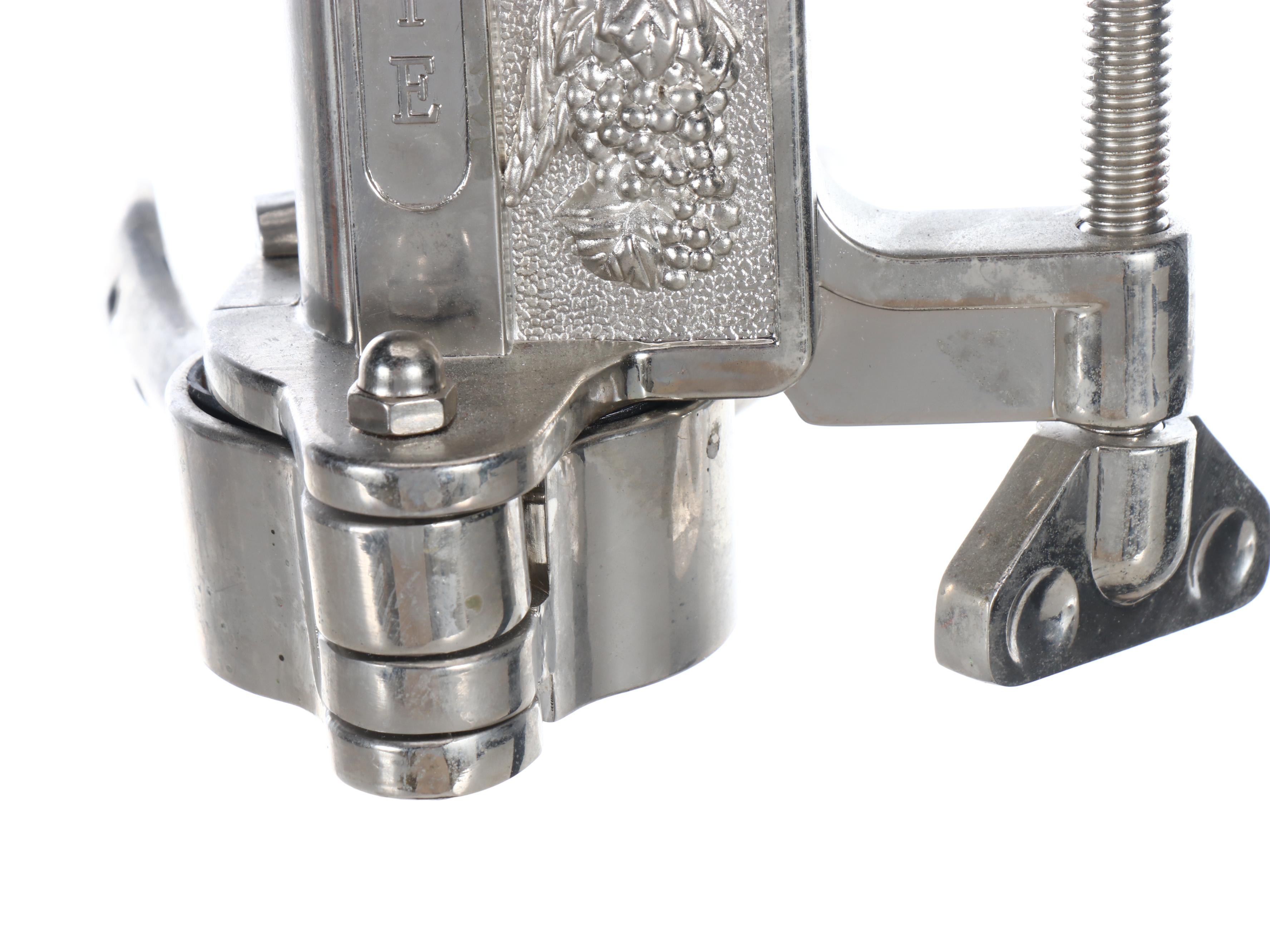 Frontgate Repoussé Metal and Black Granite Base Bottle Opener