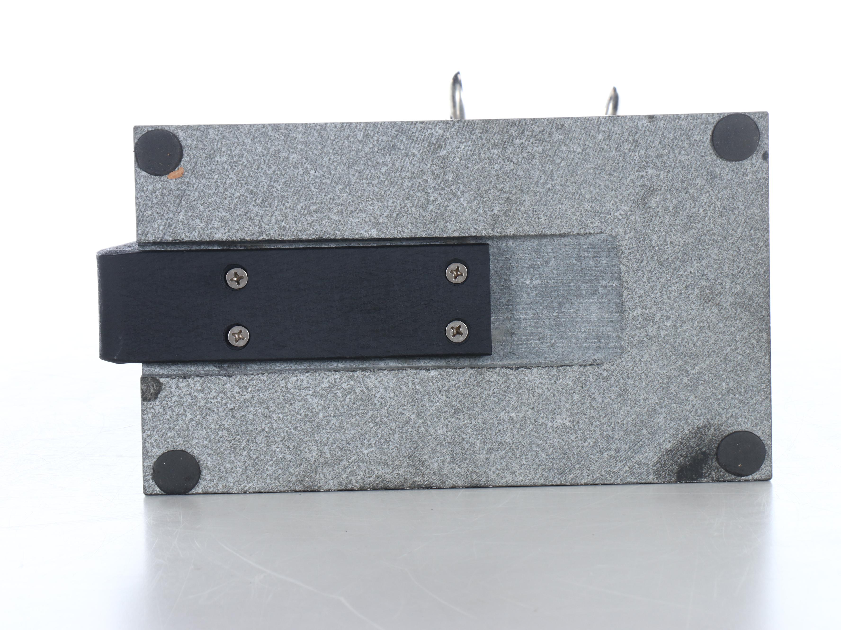 Frontgate Repoussé Metal and Black Granite Base Bottle Opener