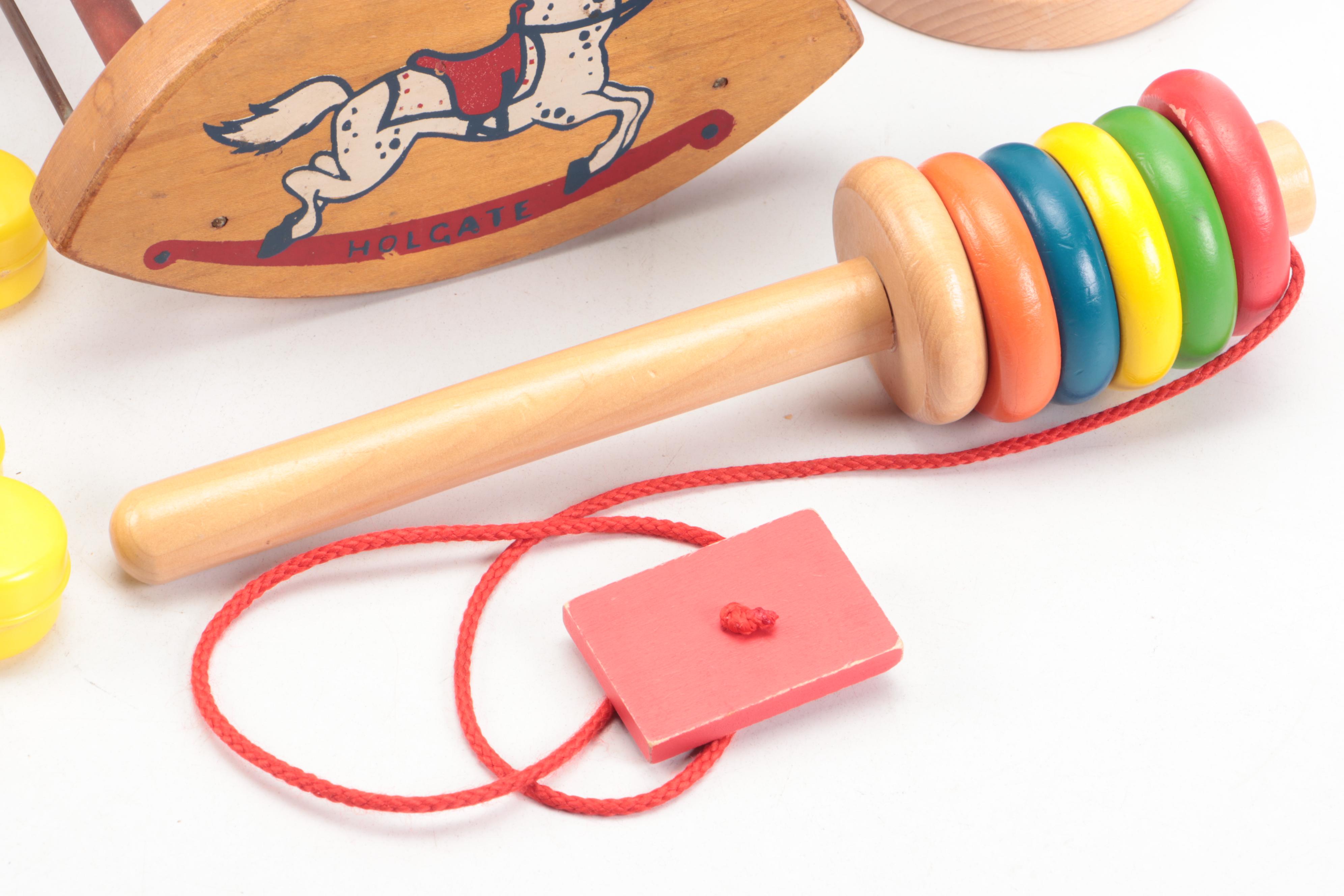 Painted Wood Toy Collection Featuring Abacuses and Stacking Toys