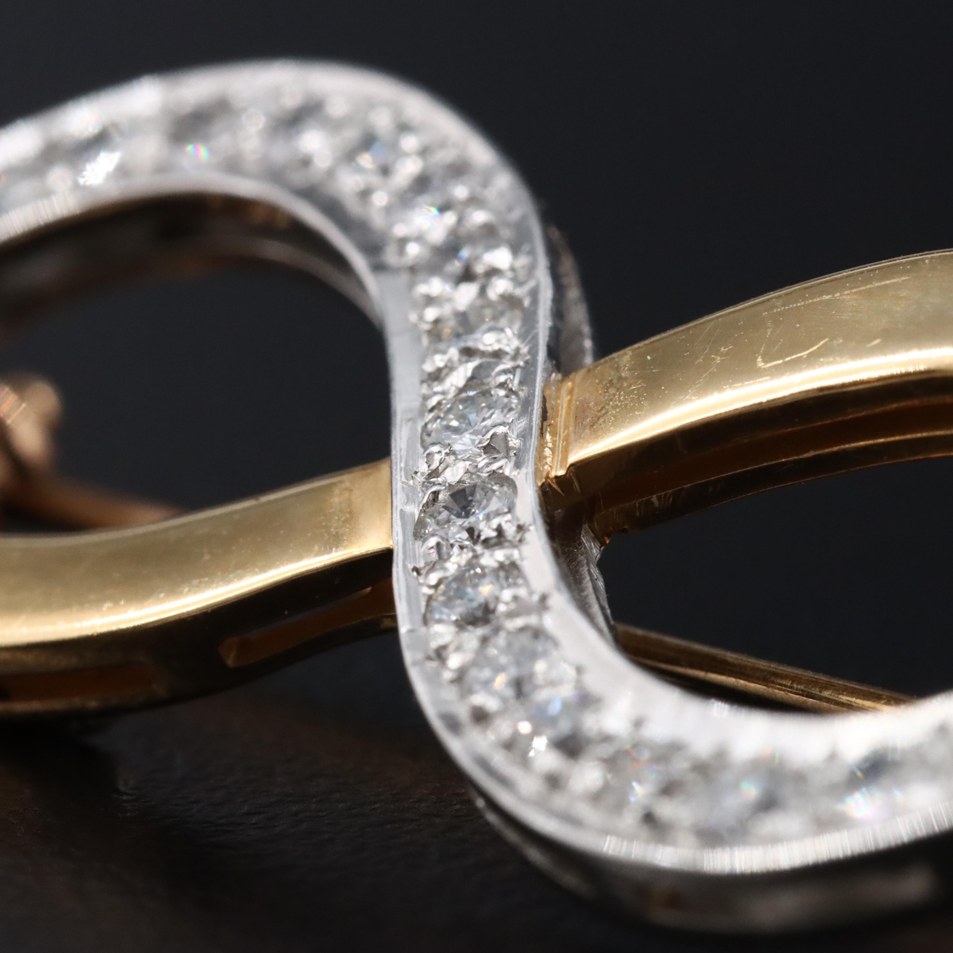 Platinum and 18K 0.64 CTW Diamond Infinity Brooch