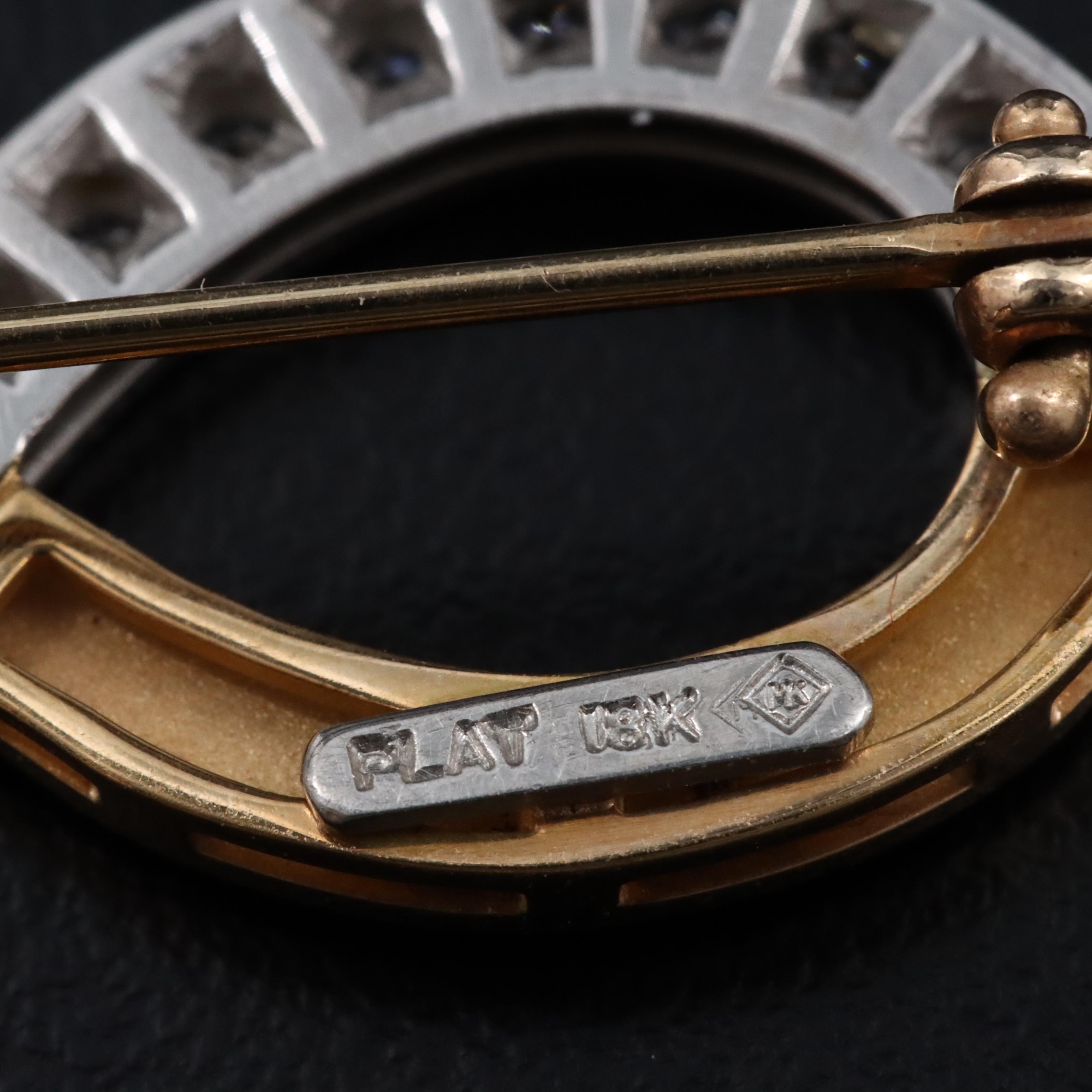 Platinum and 18K 0.64 CTW Diamond Infinity Brooch