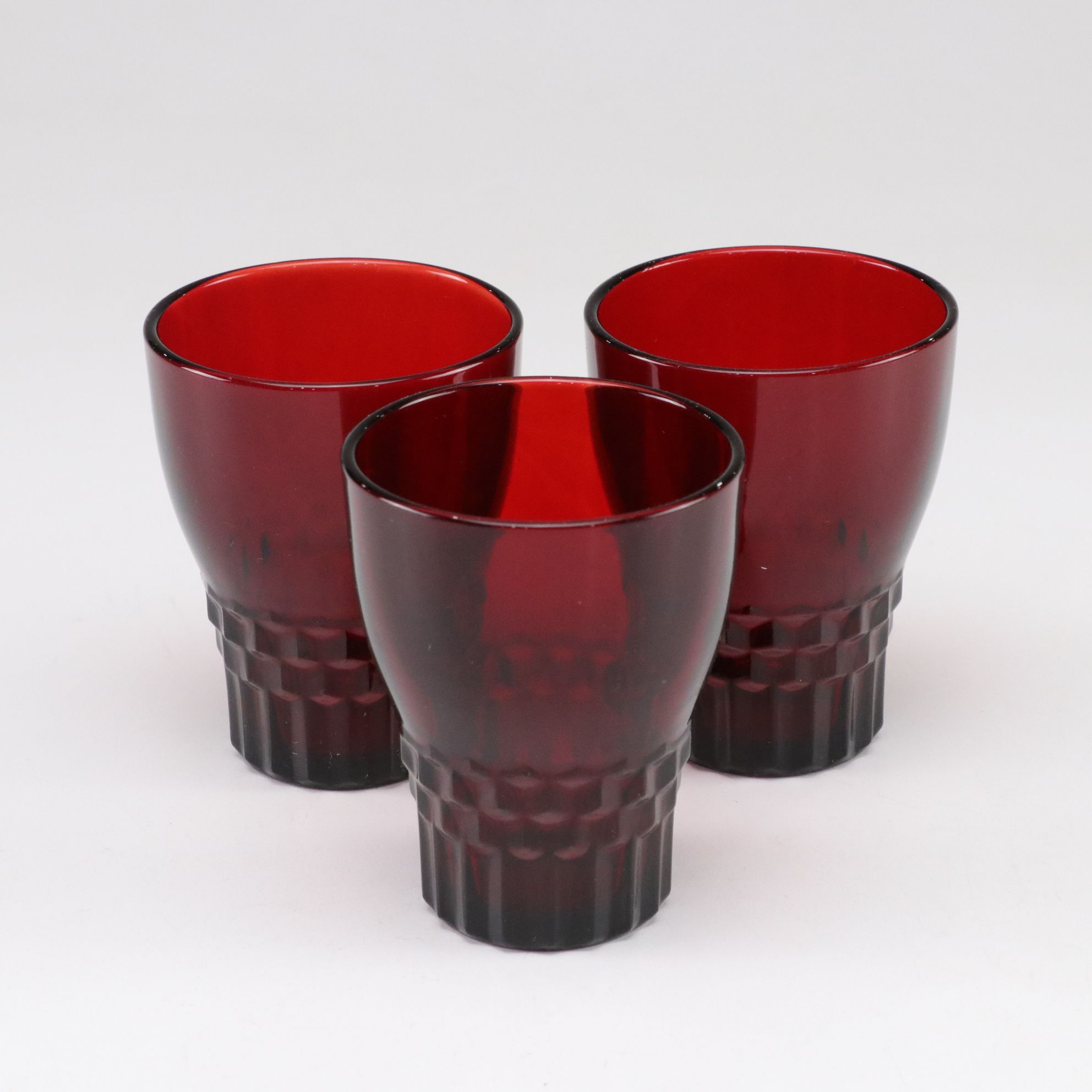 Ruby Red Glass with Anchor Hocking Vases and Three "Windsor" Glasses