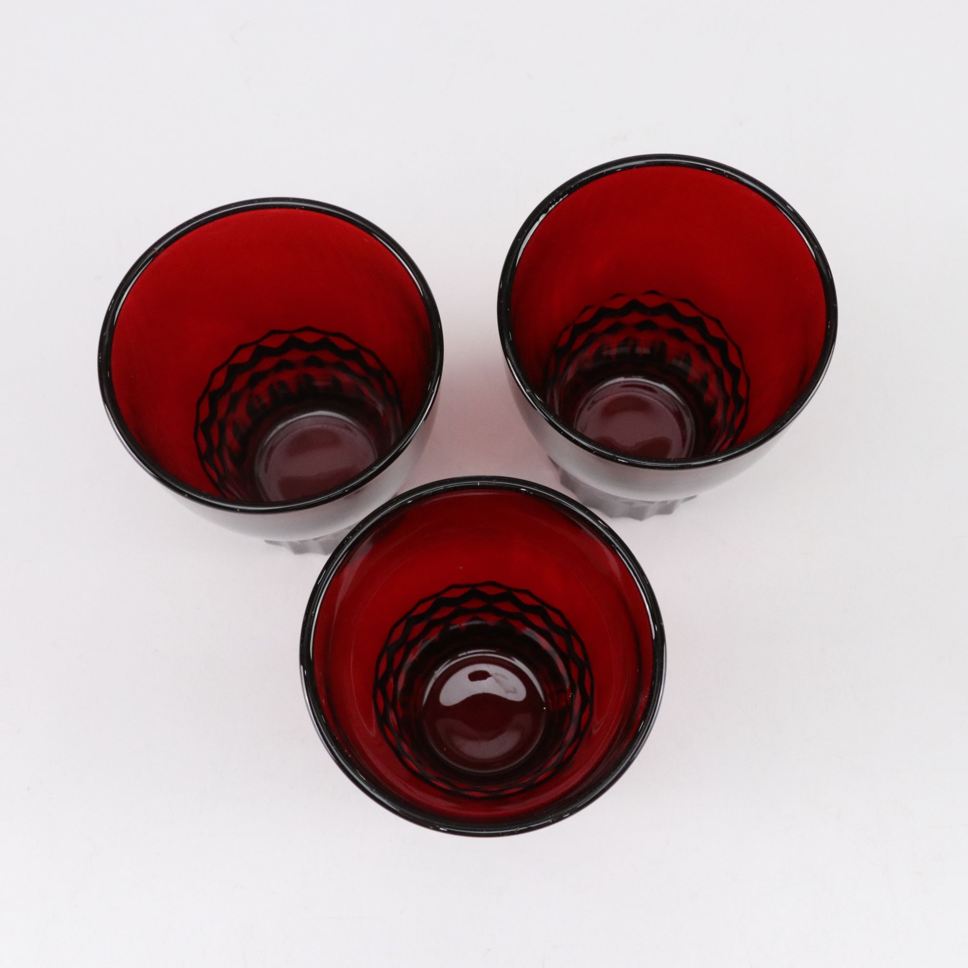 Ruby Red Glass with Anchor Hocking Vases and Three "Windsor" Glasses