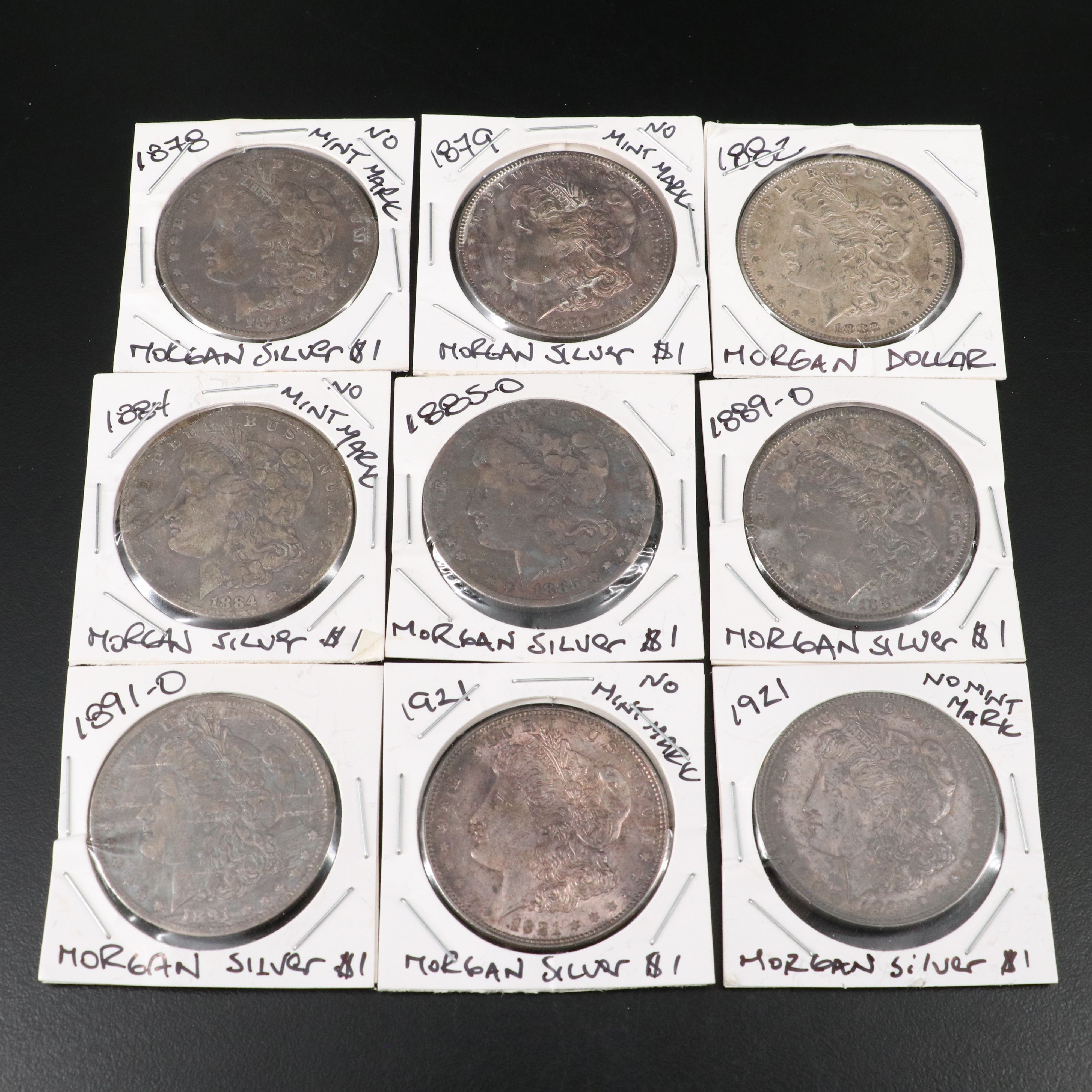 Nine Morgan Silver Dollars