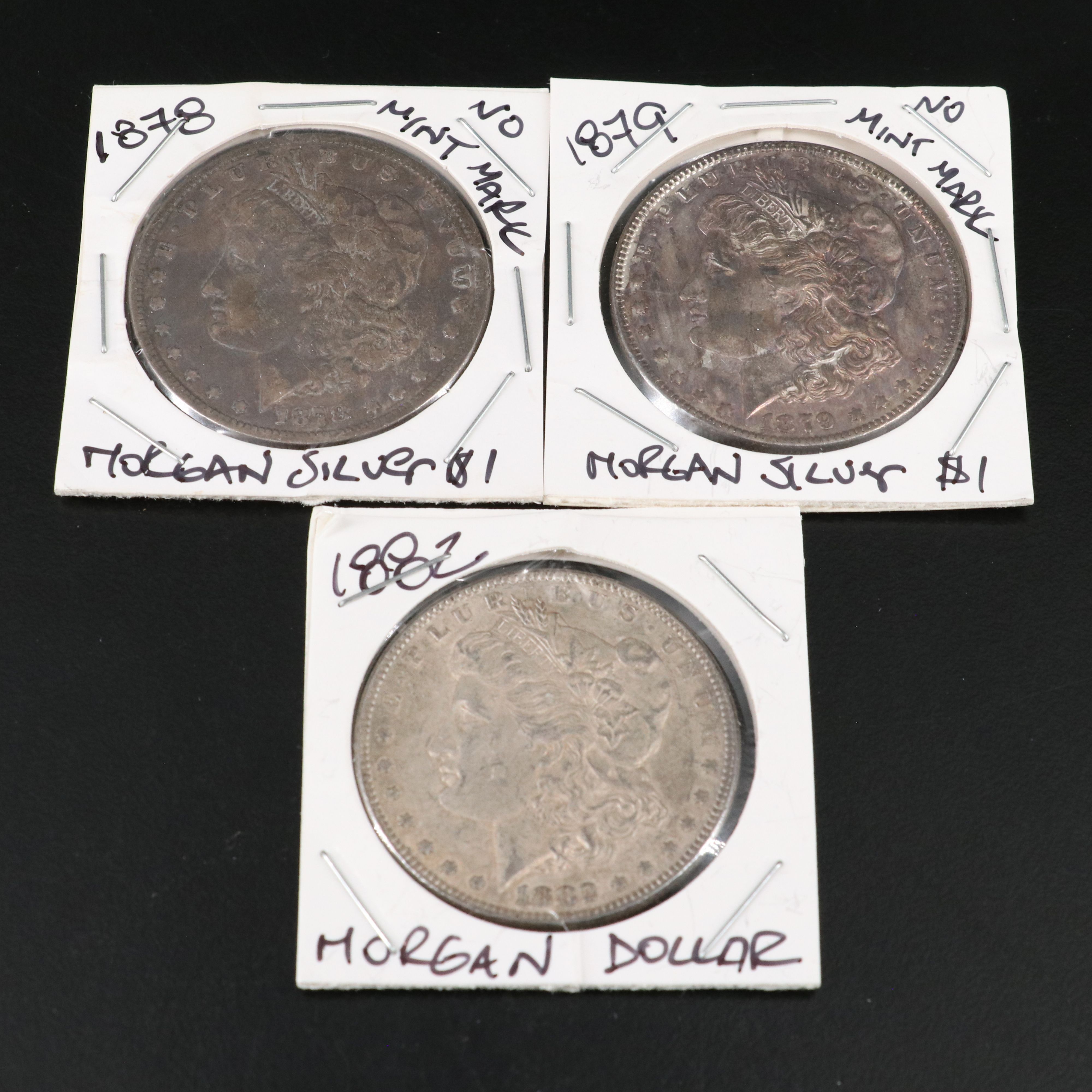Nine Morgan Silver Dollars
