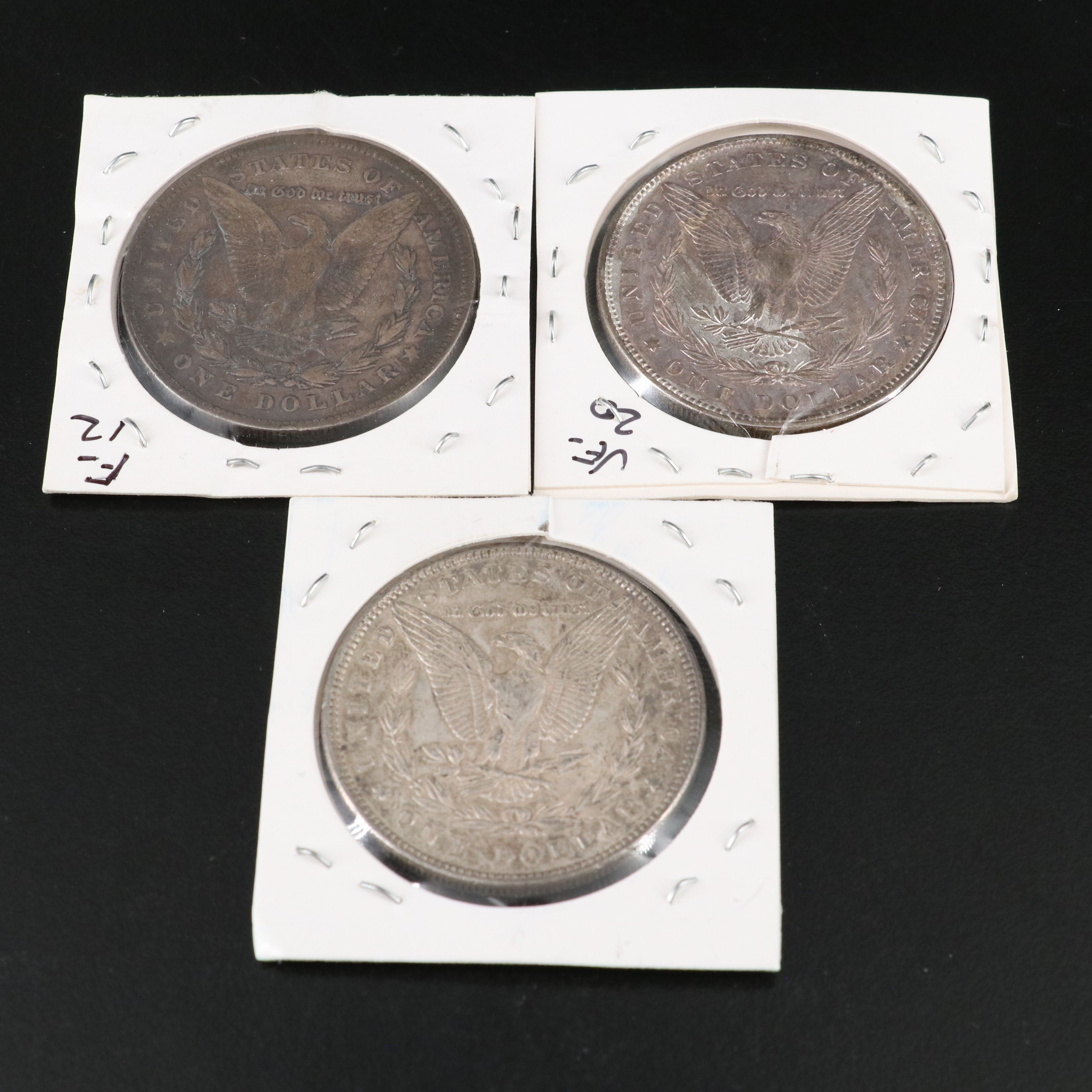 Nine Morgan Silver Dollars