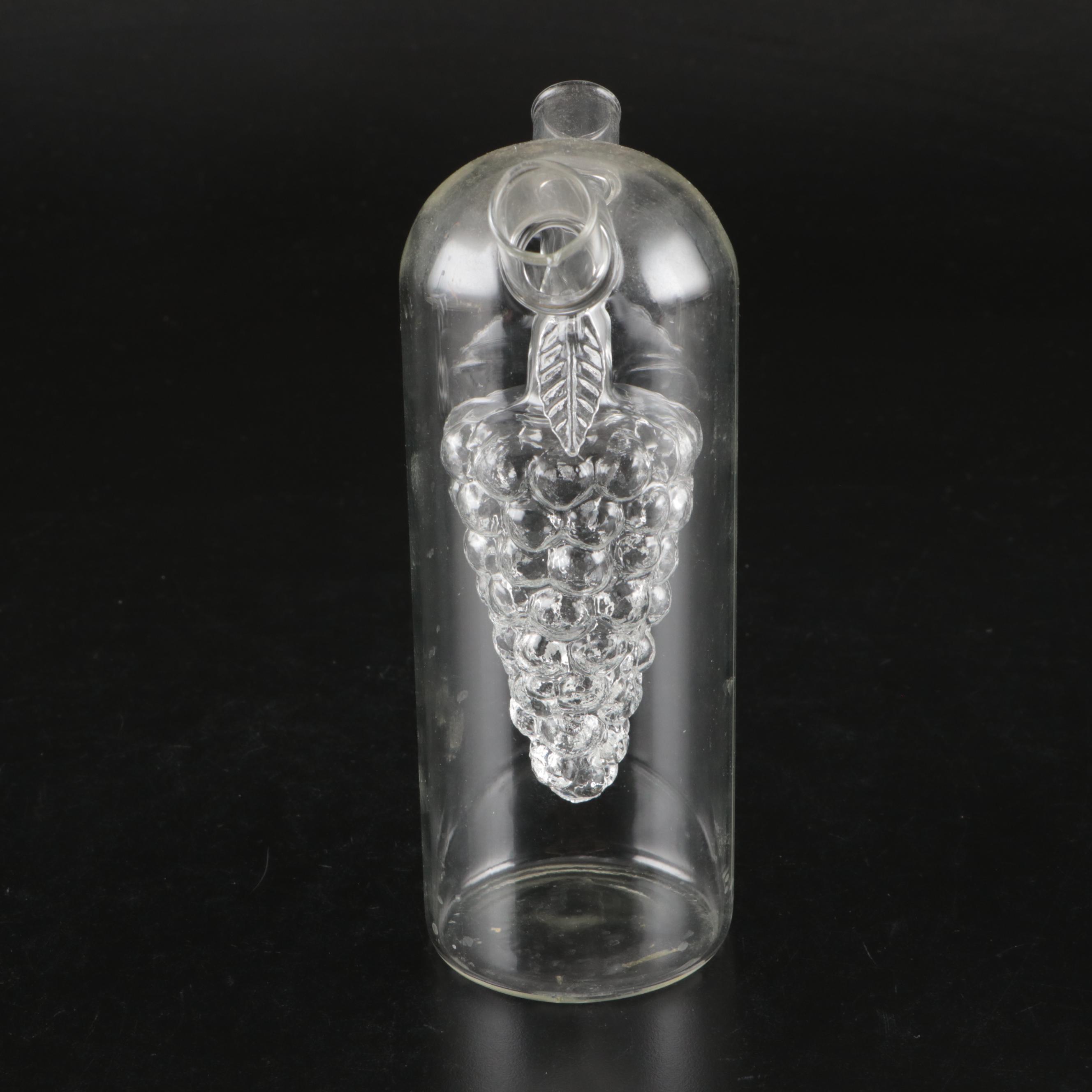 Blown Glass Ship in a Bottle Drinks Dispenser with Other Bottles and Decor