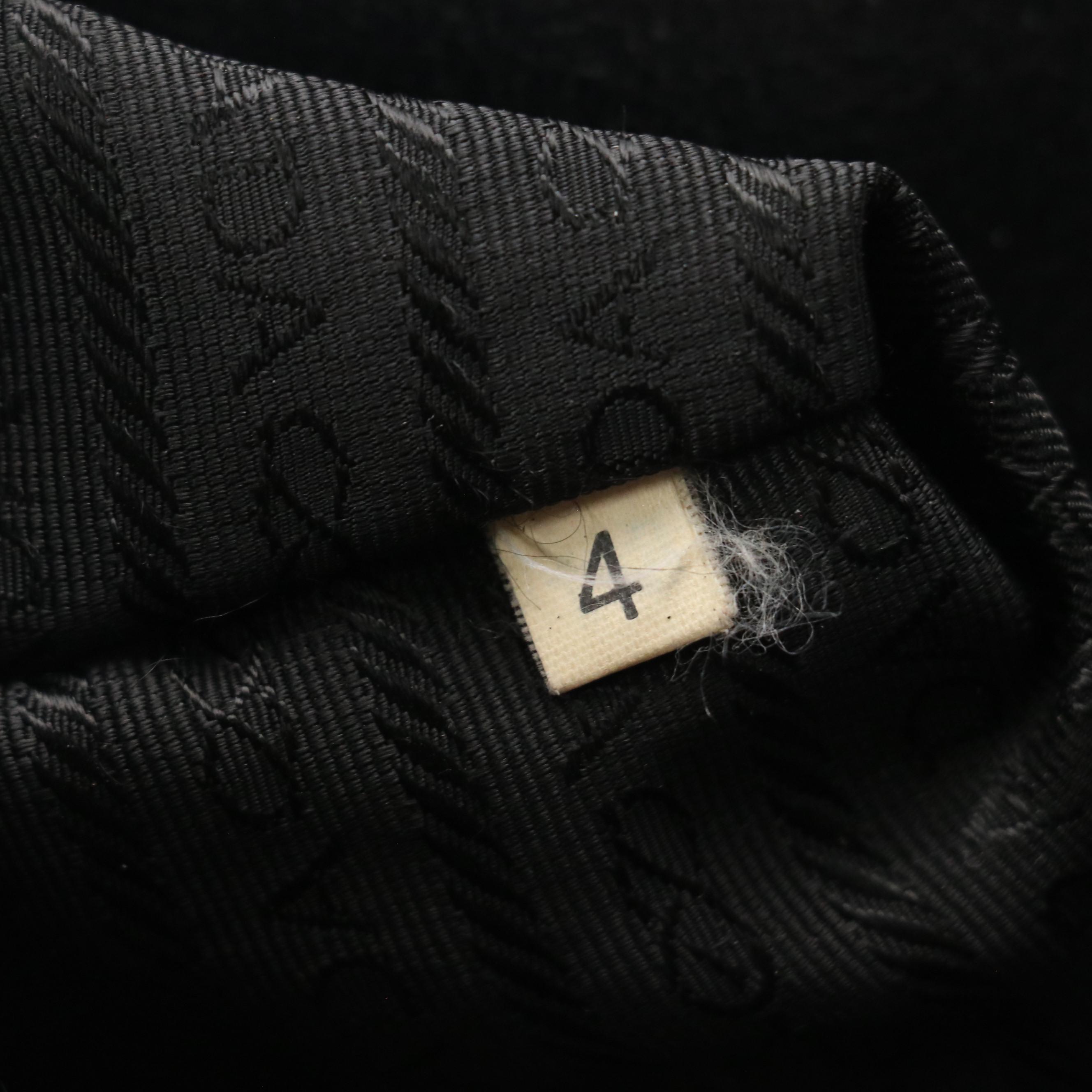 Prada Shoulder Bag in Black Perforated Leather with Contrast Stitching