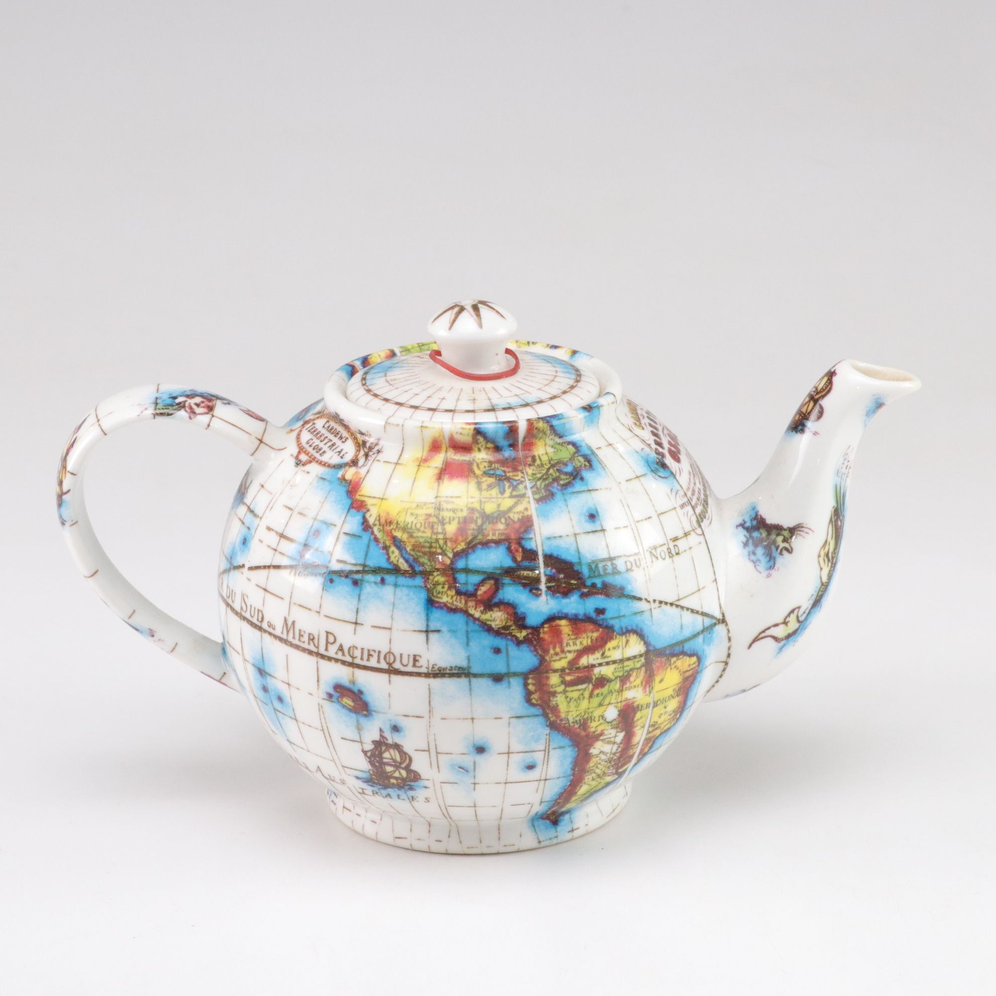 Paul Cardew "Globe" Teapot with Chinese Porcelain Teapot and Vase and Framed Map