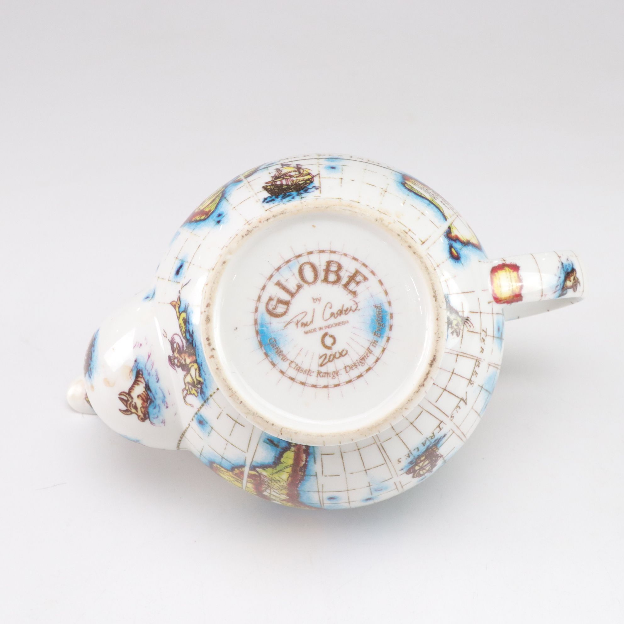 Paul Cardew "Globe" Teapot with Chinese Porcelain Teapot and Vase and Framed Map