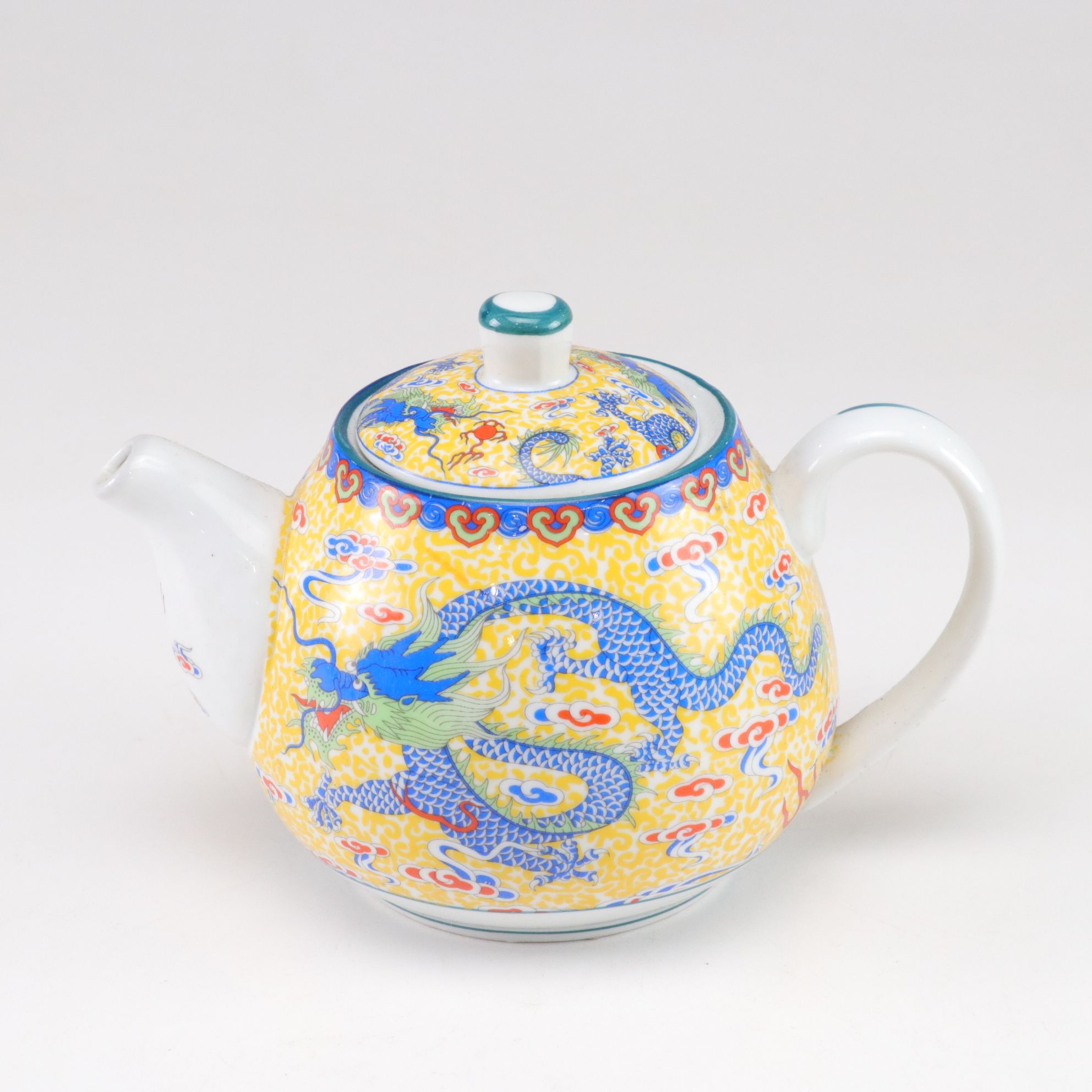 Paul Cardew "Globe" Teapot with Chinese Porcelain Teapot and Vase and Framed Map