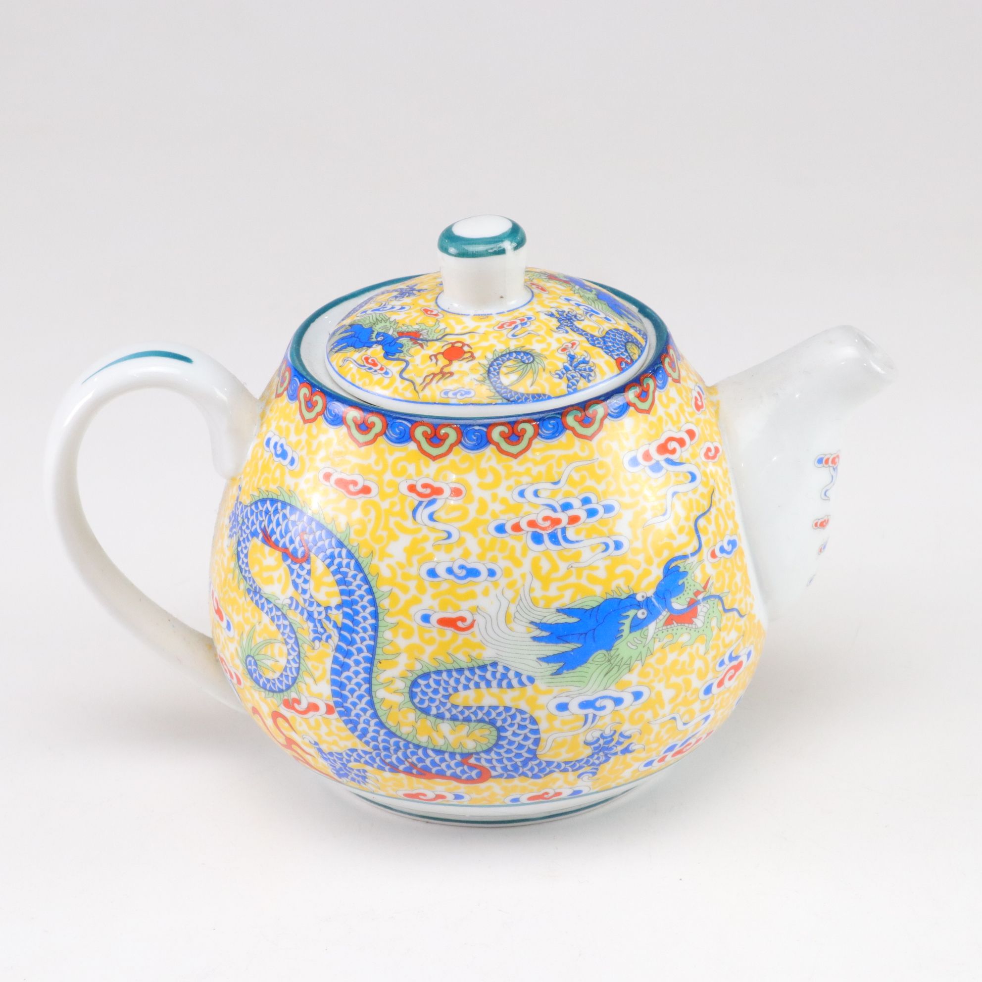 Paul Cardew "Globe" Teapot with Chinese Porcelain Teapot and Vase and Framed Map