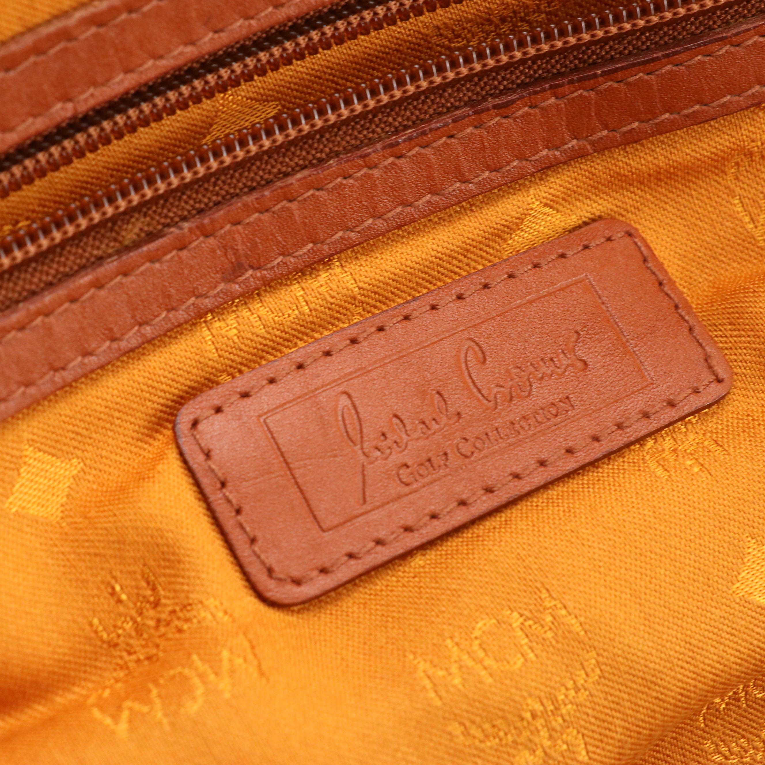 MCM Golf Collection Small Duffle Bag in Cognac Visetos Canvas and Leather