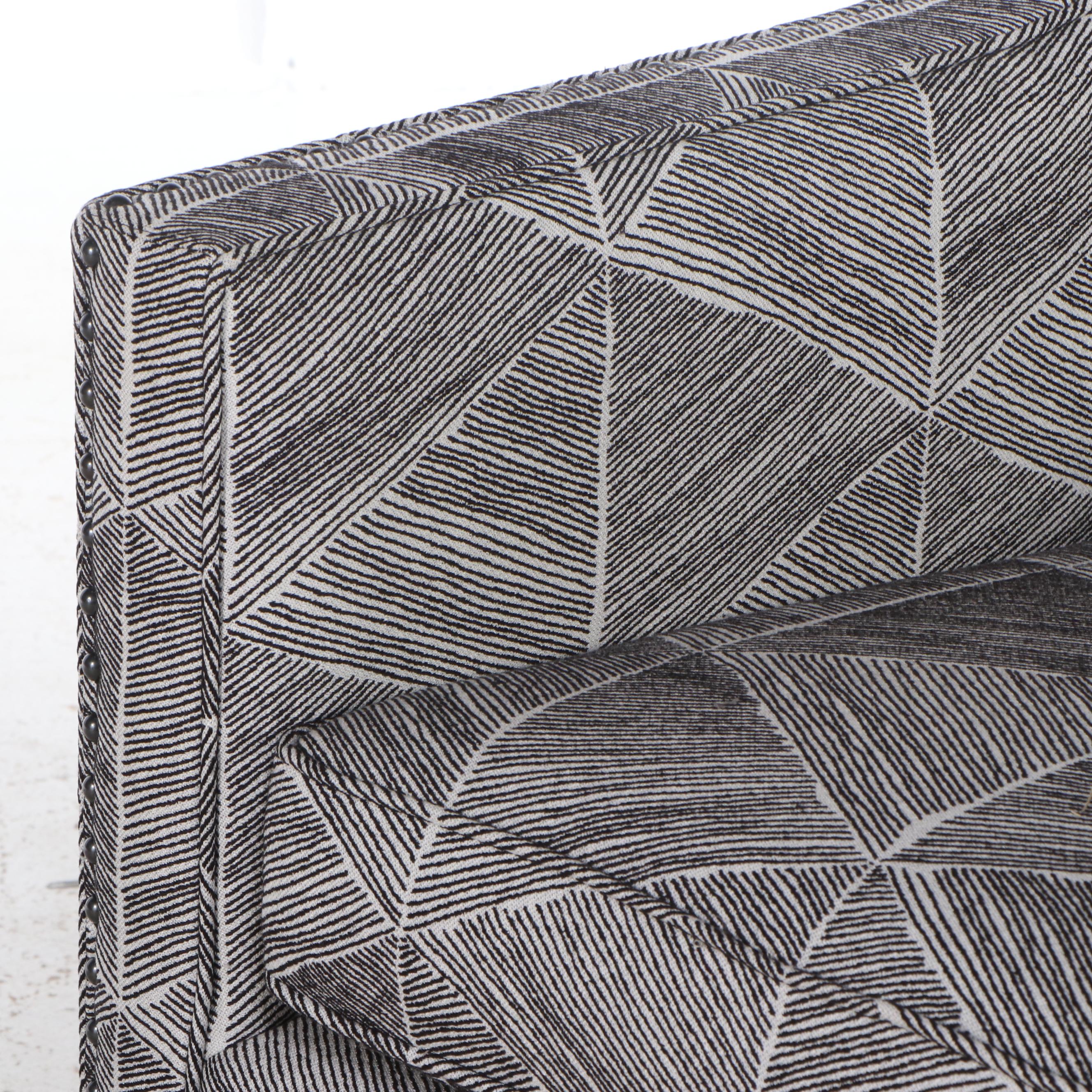 Contemporary Black and White Upholstered Swivel Club Chair