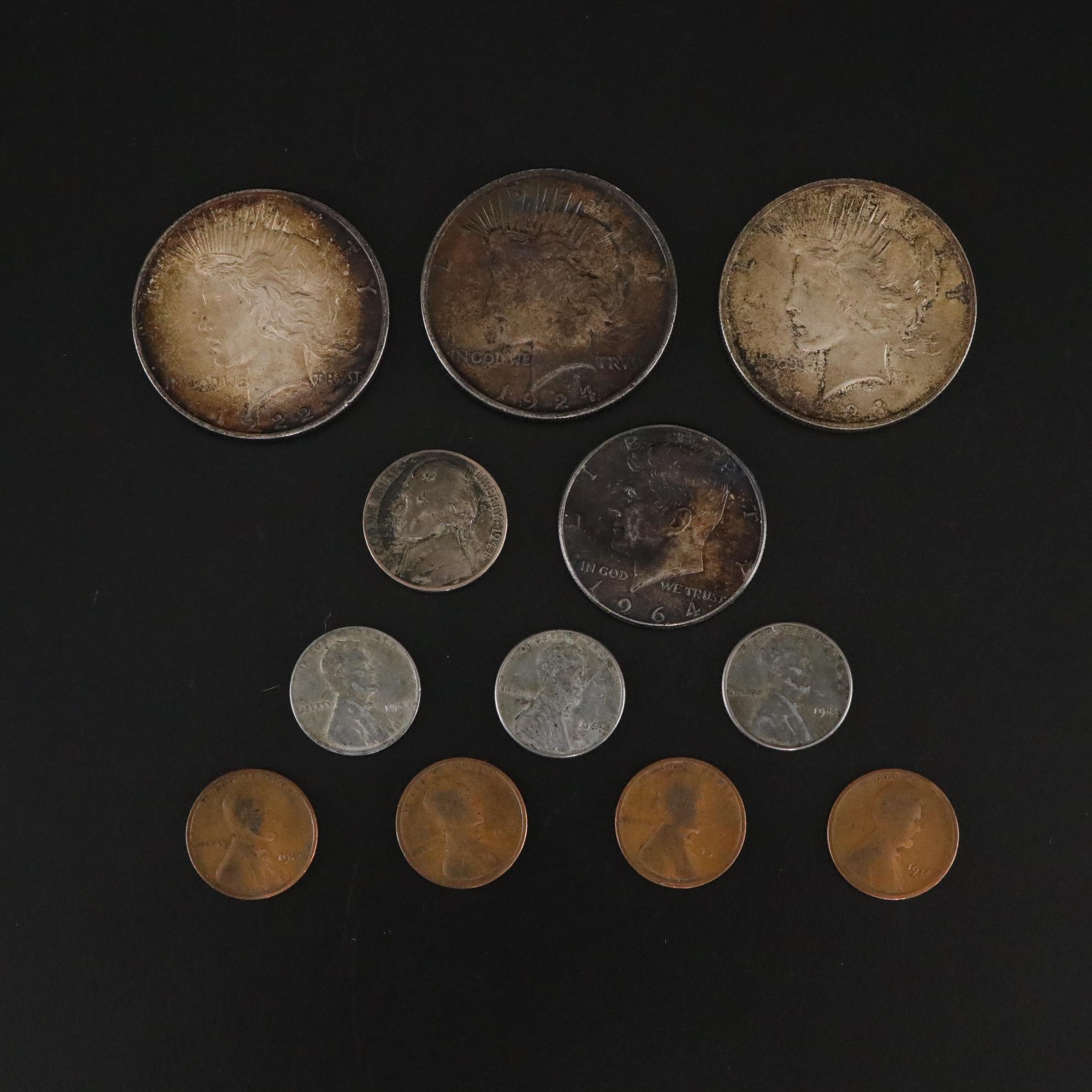 Three Peace Dollars, One 1964 Kennedy Half Dollar, and Other US Coins