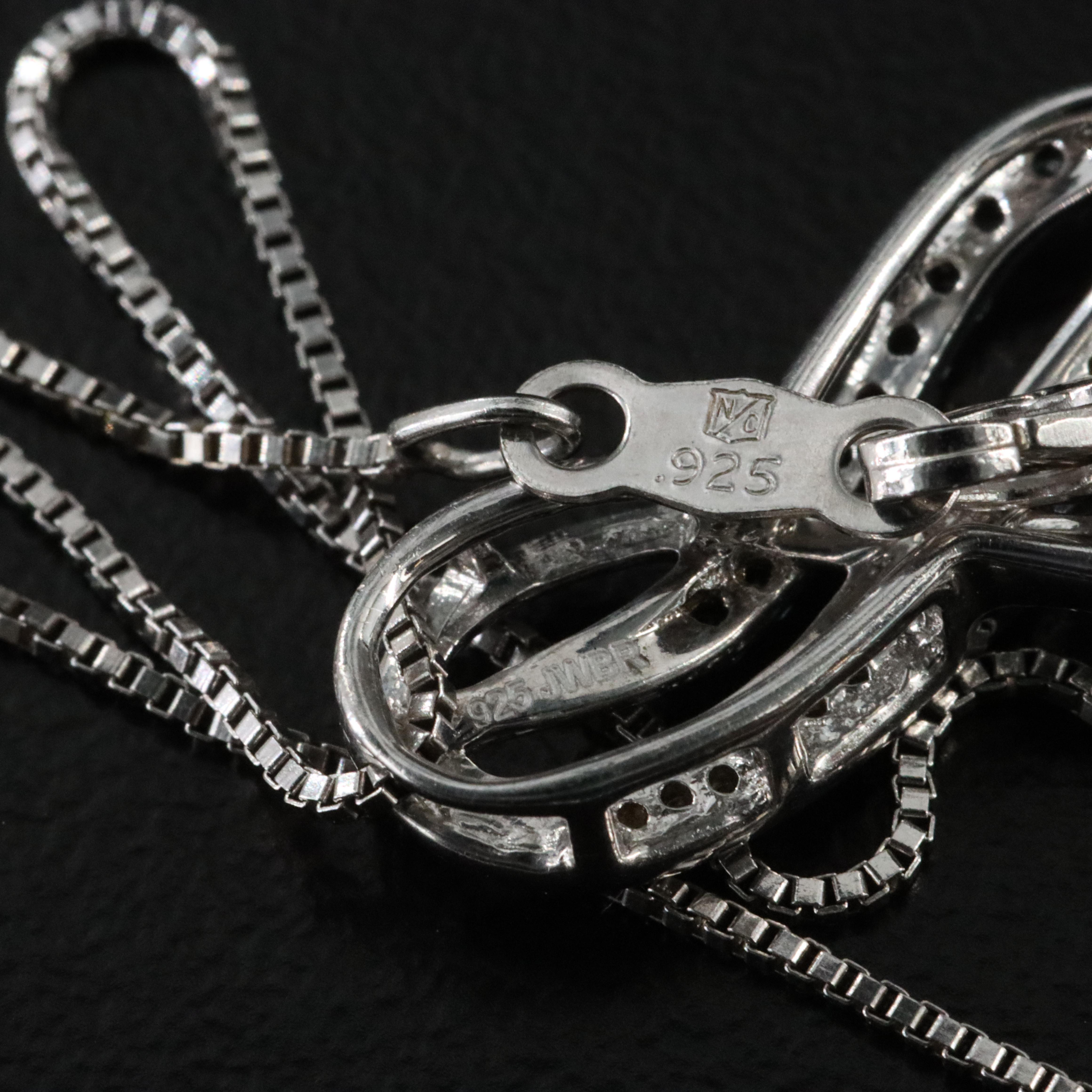 Sterling Blue Topaz and White Sapphire Figure Eight Pendant Necklace