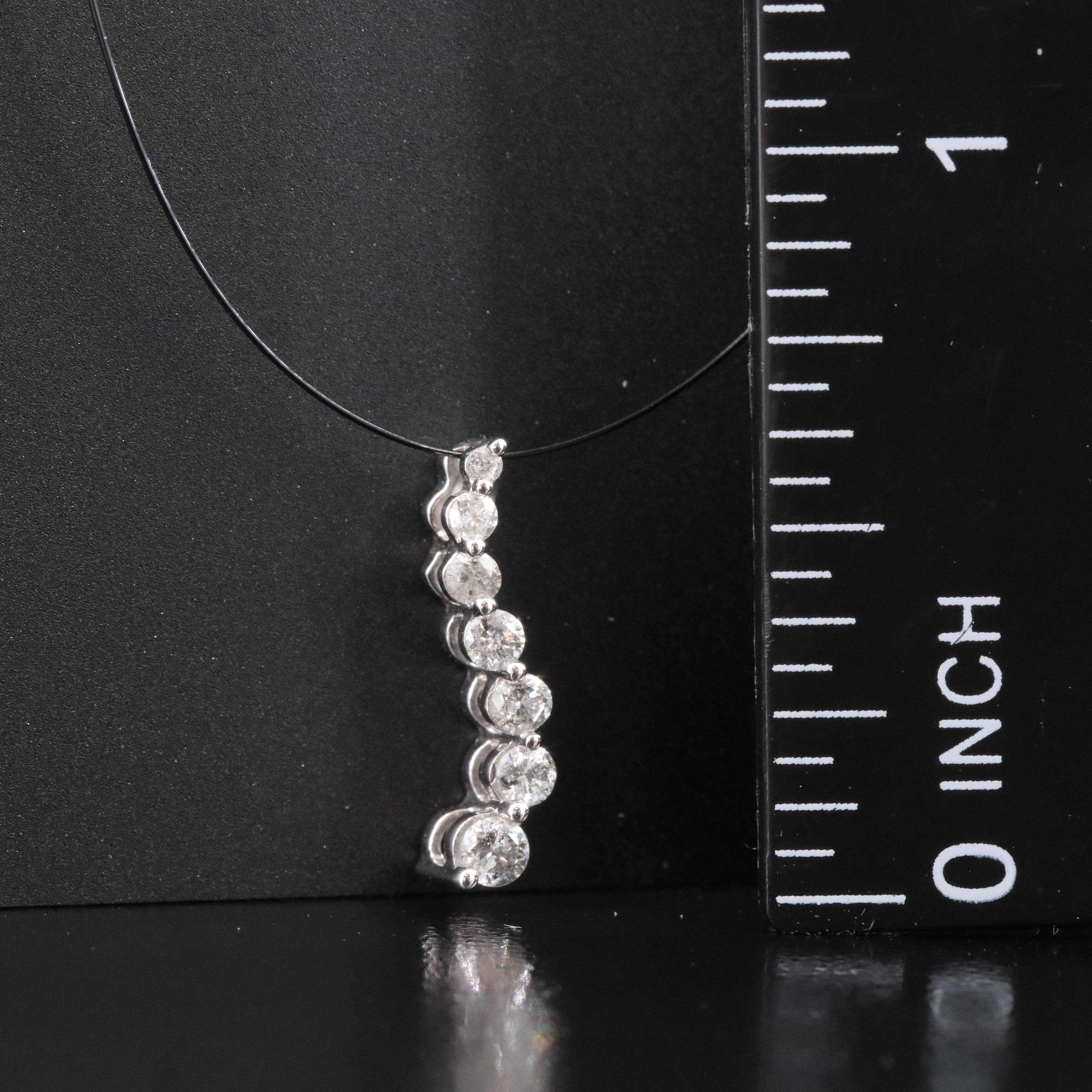 10K 0.22 CTW Diamond Graduated Journey Pendant