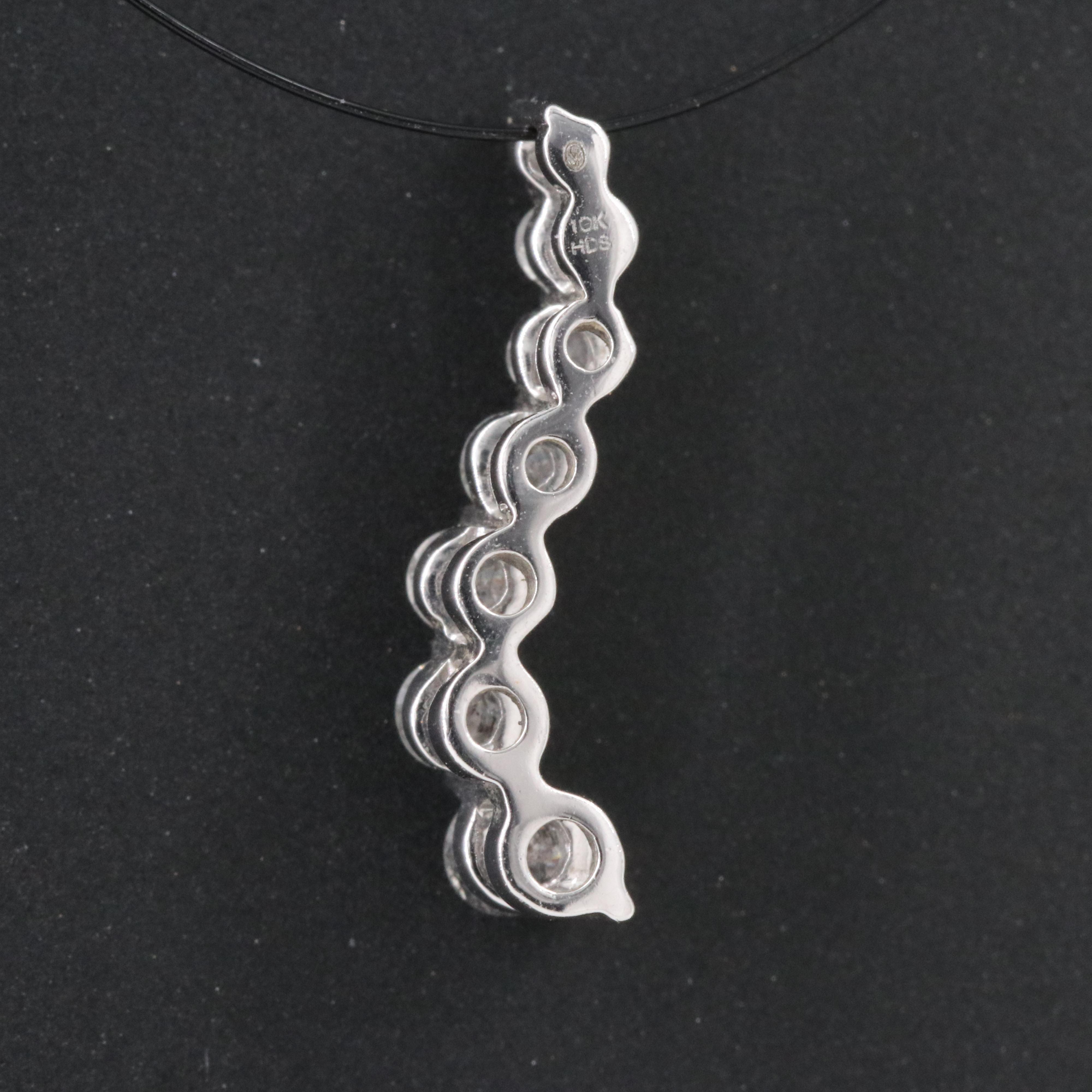 10K 0.22 CTW Diamond Graduated Journey Pendant