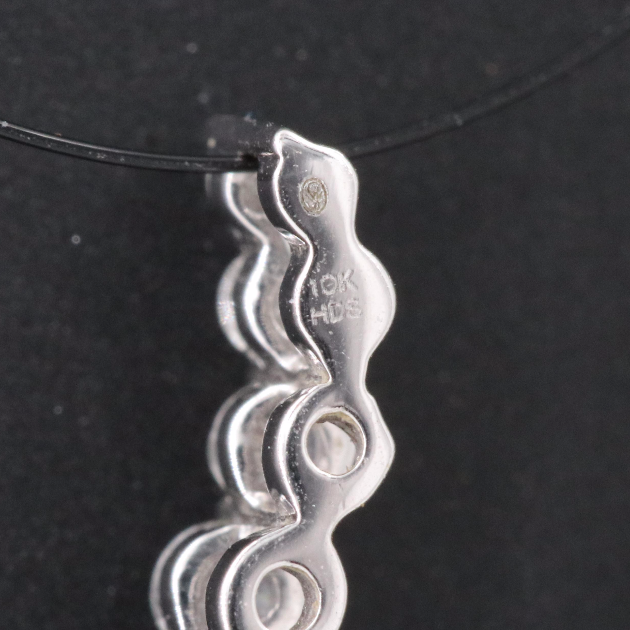 10K 0.22 CTW Diamond Graduated Journey Pendant