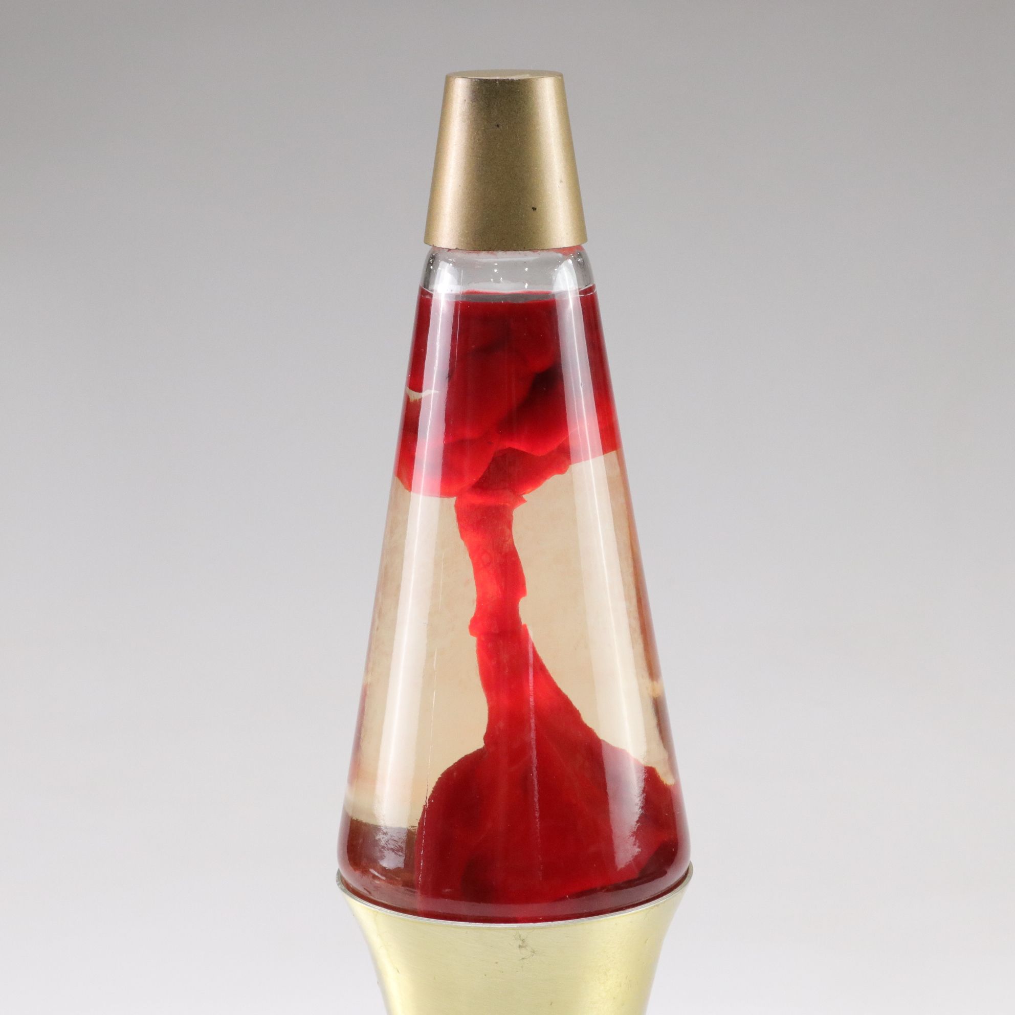 Red Lava Lamp with Gold Tone Base, Mid to Late 20th C.
