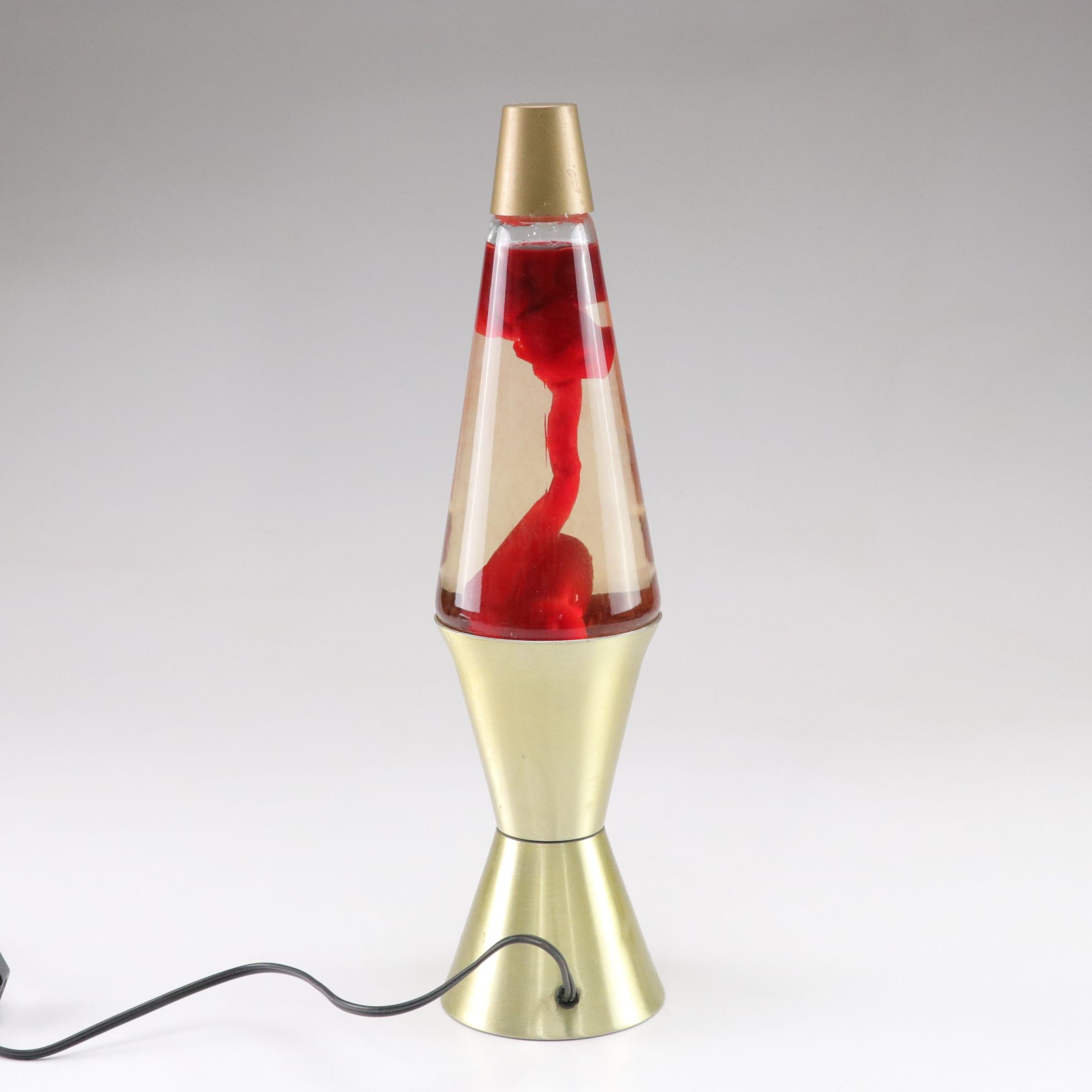 Red Lava Lamp with Gold Tone Base, Mid to Late 20th C.